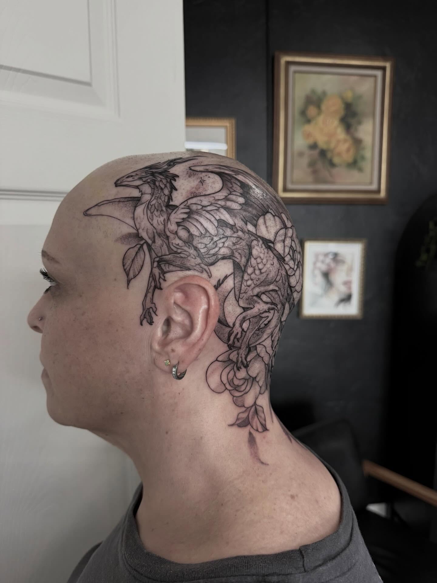 Phoenix and flowers black and grey tattoo on the head by Emma Mathis, Springfield, Oregon