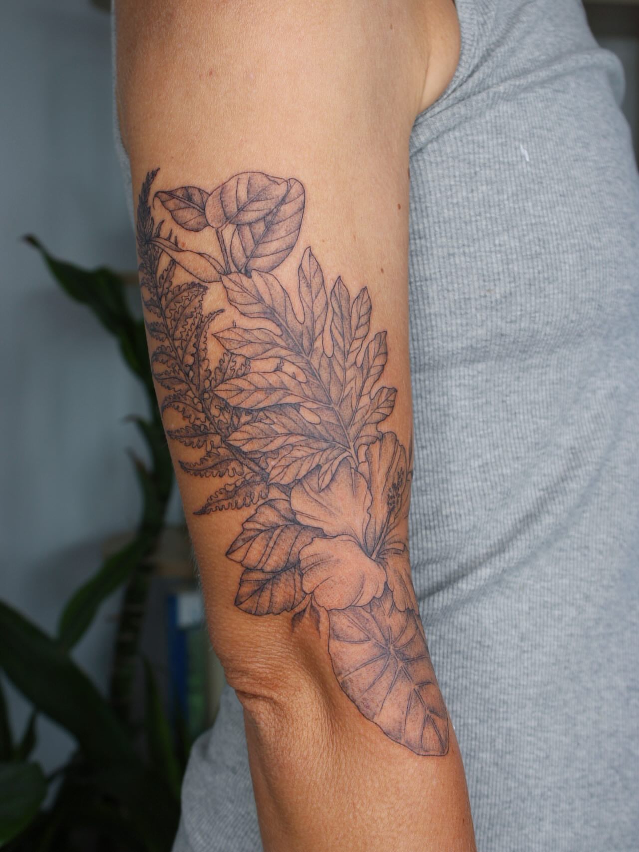 Floral arrangement black and grey tattoo on the forearm by Priscila - HAWAII TATTOO