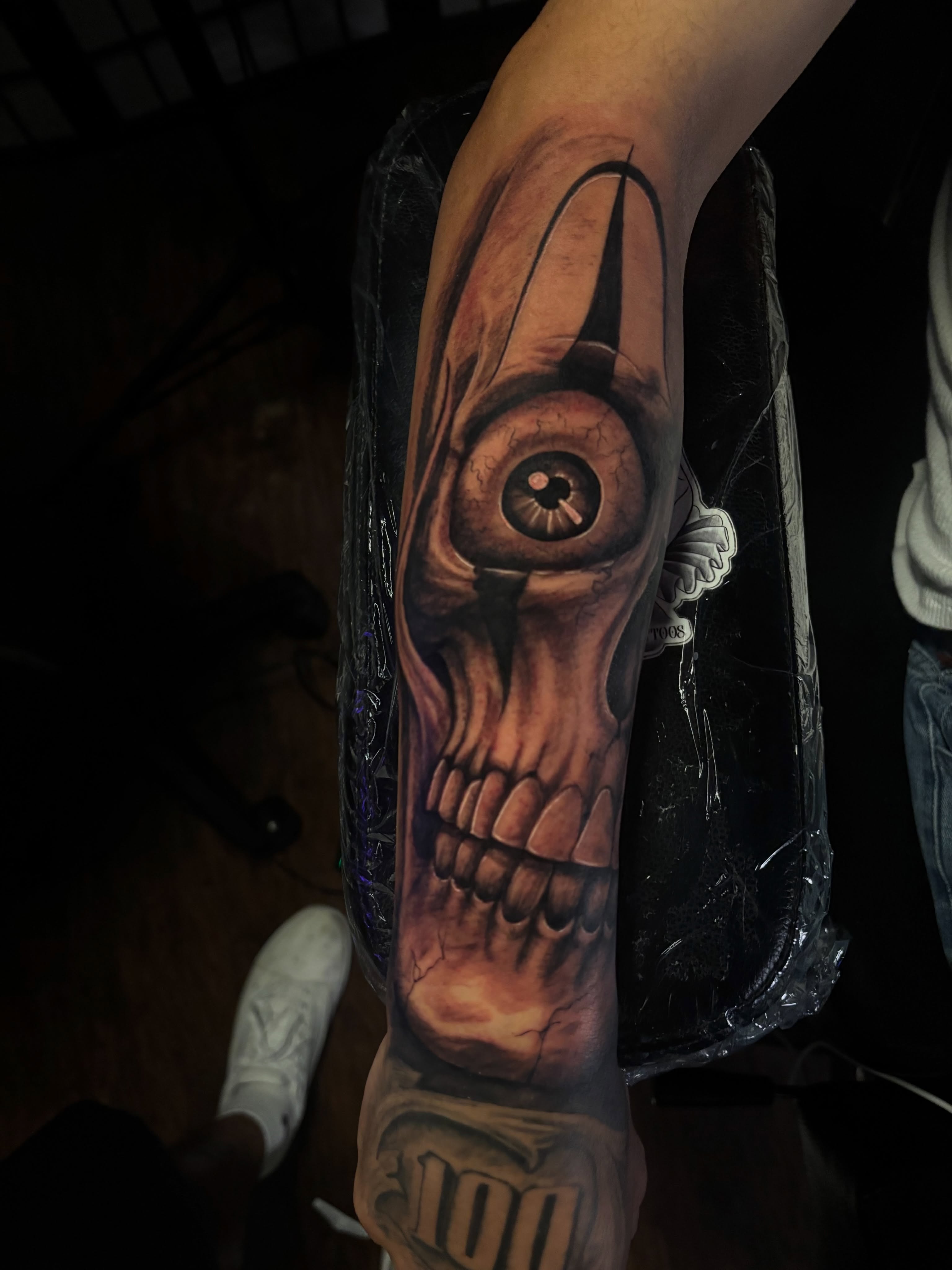 Skull realism tattoo on the forearm by Terik Whittaker