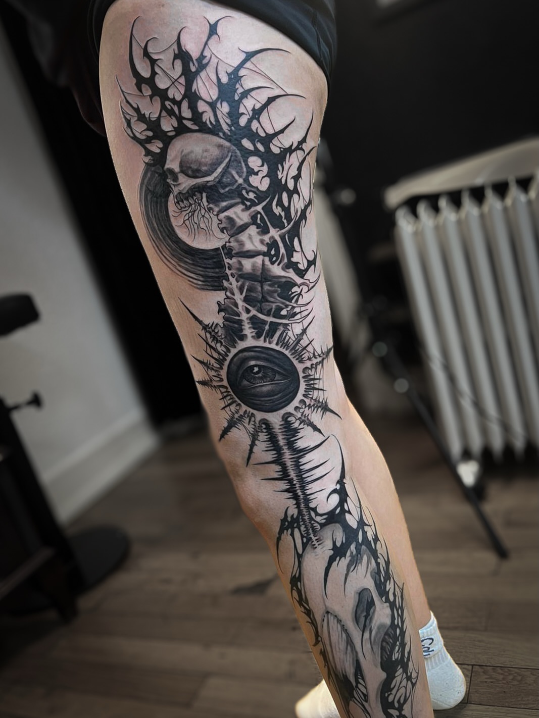 Tattoo by @crawlspace_tattoo — black_and_grey, dark_realism