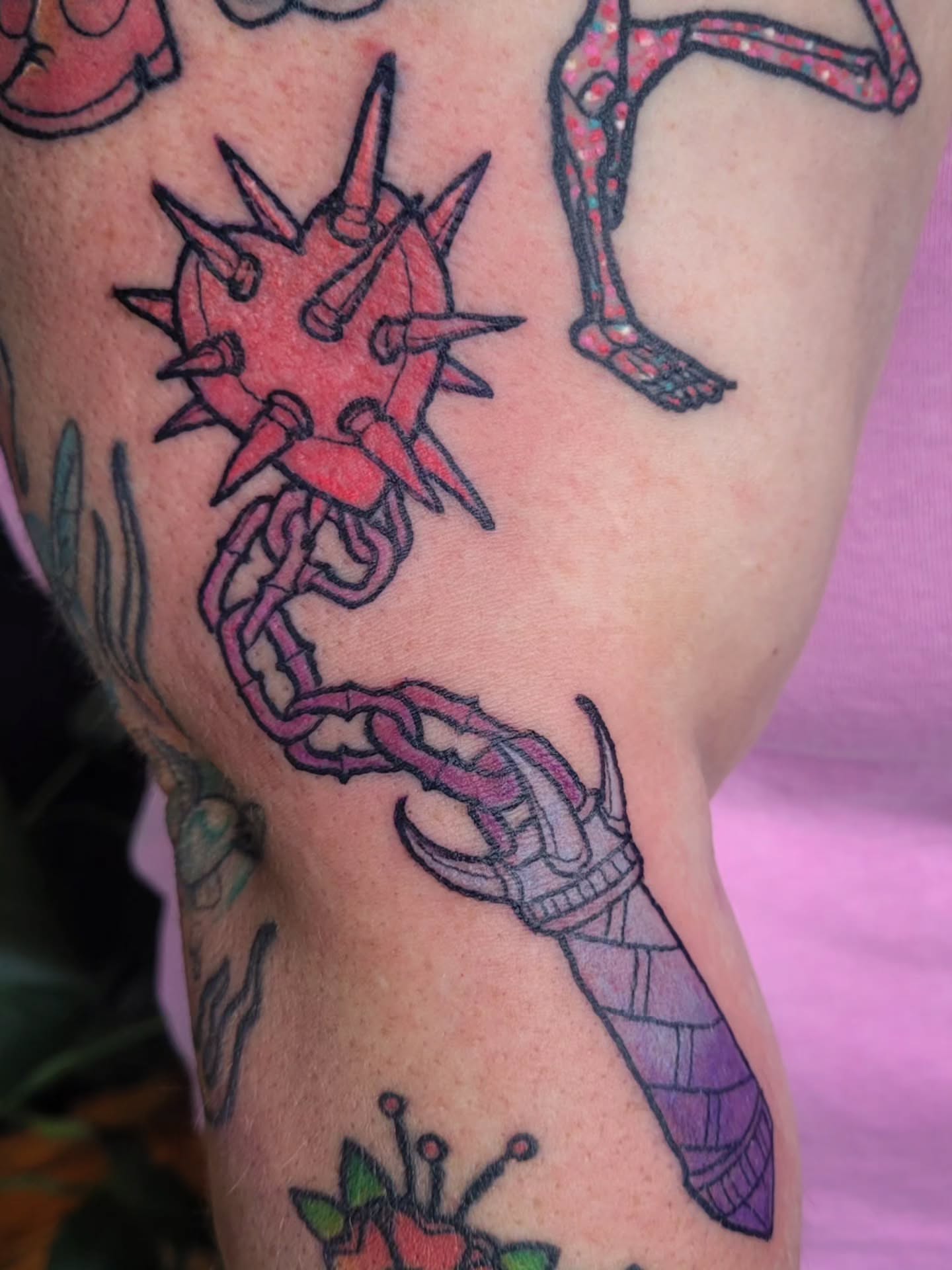 Spiked creature neo-traditional tattoo on the thigh by Ashley Thomas, Midvale, Utah
