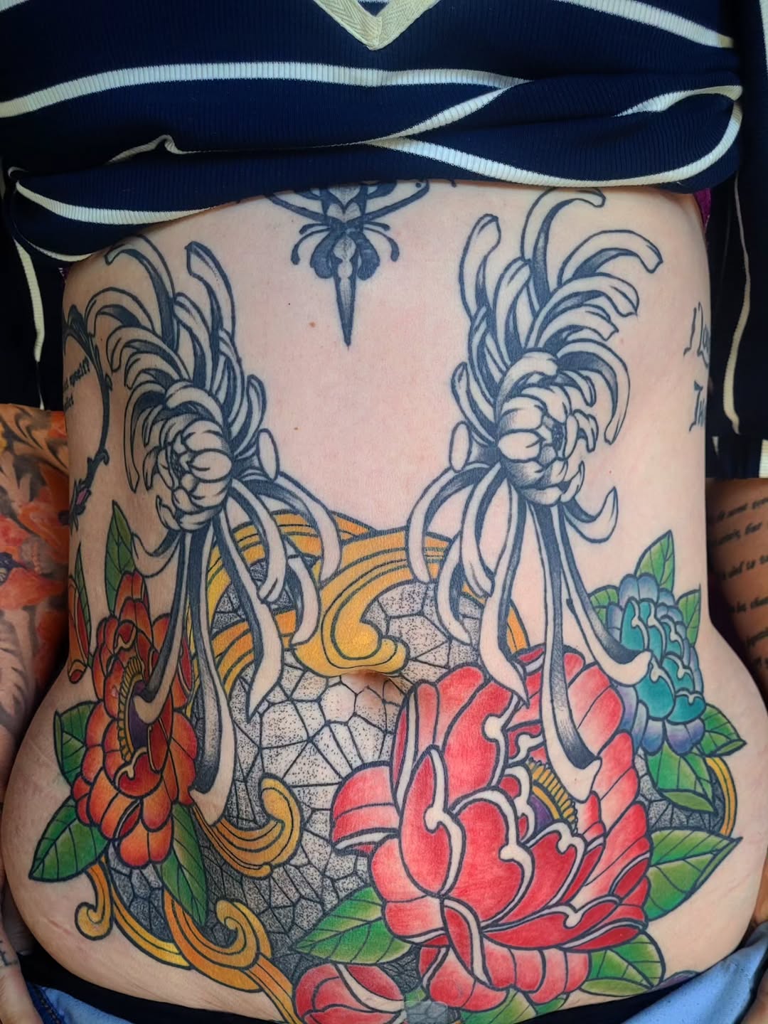 Chrysanthemums and peonies Japanese tattoo on the thigh by Ashley Thomas, Midvale, Utah
