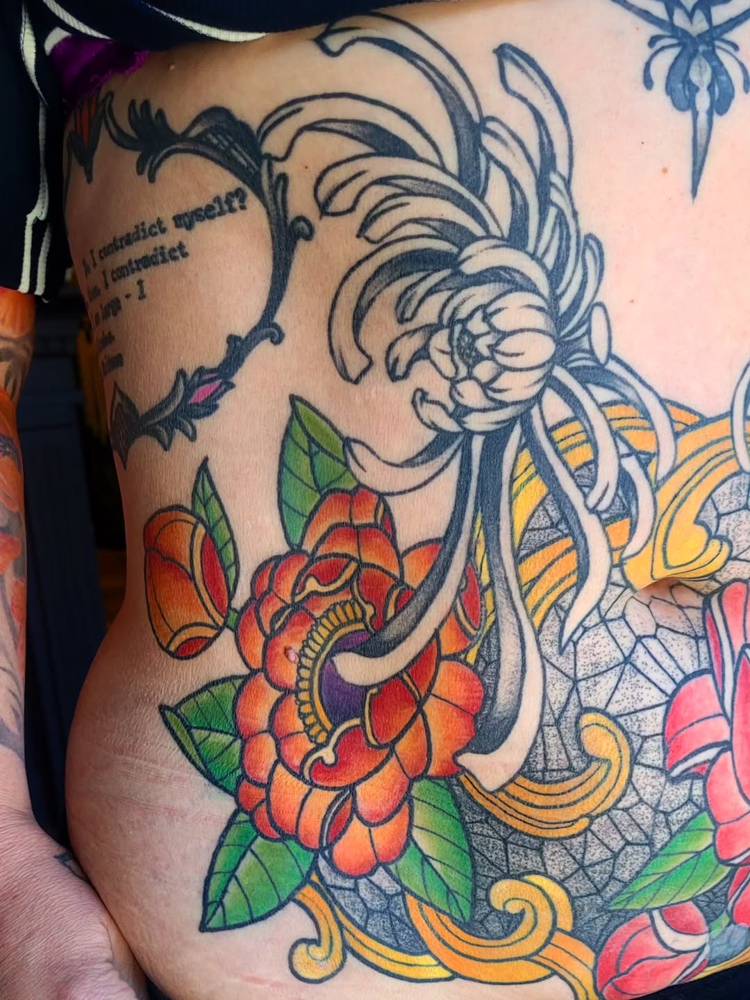Chrysanthemum and rose with lettering neo-traditional tattoo on the thigh by Ashley Thomas, Midvale, Utah