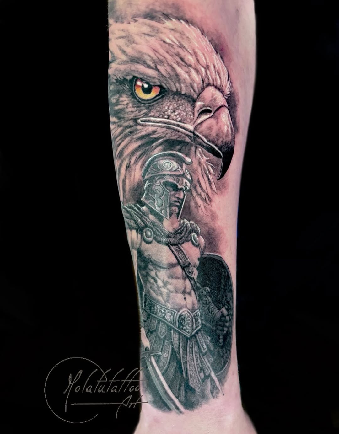 Eagle and warrior realism tattoo on the forearm by Molatutattoo