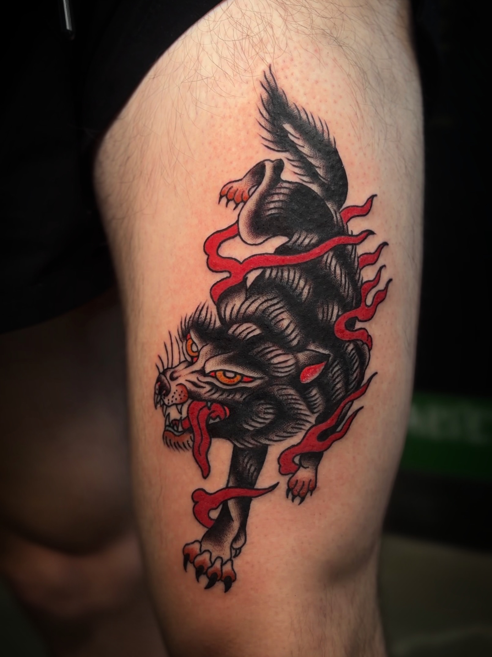 Lion American traditional tattoo on the thigh by MoogieTats