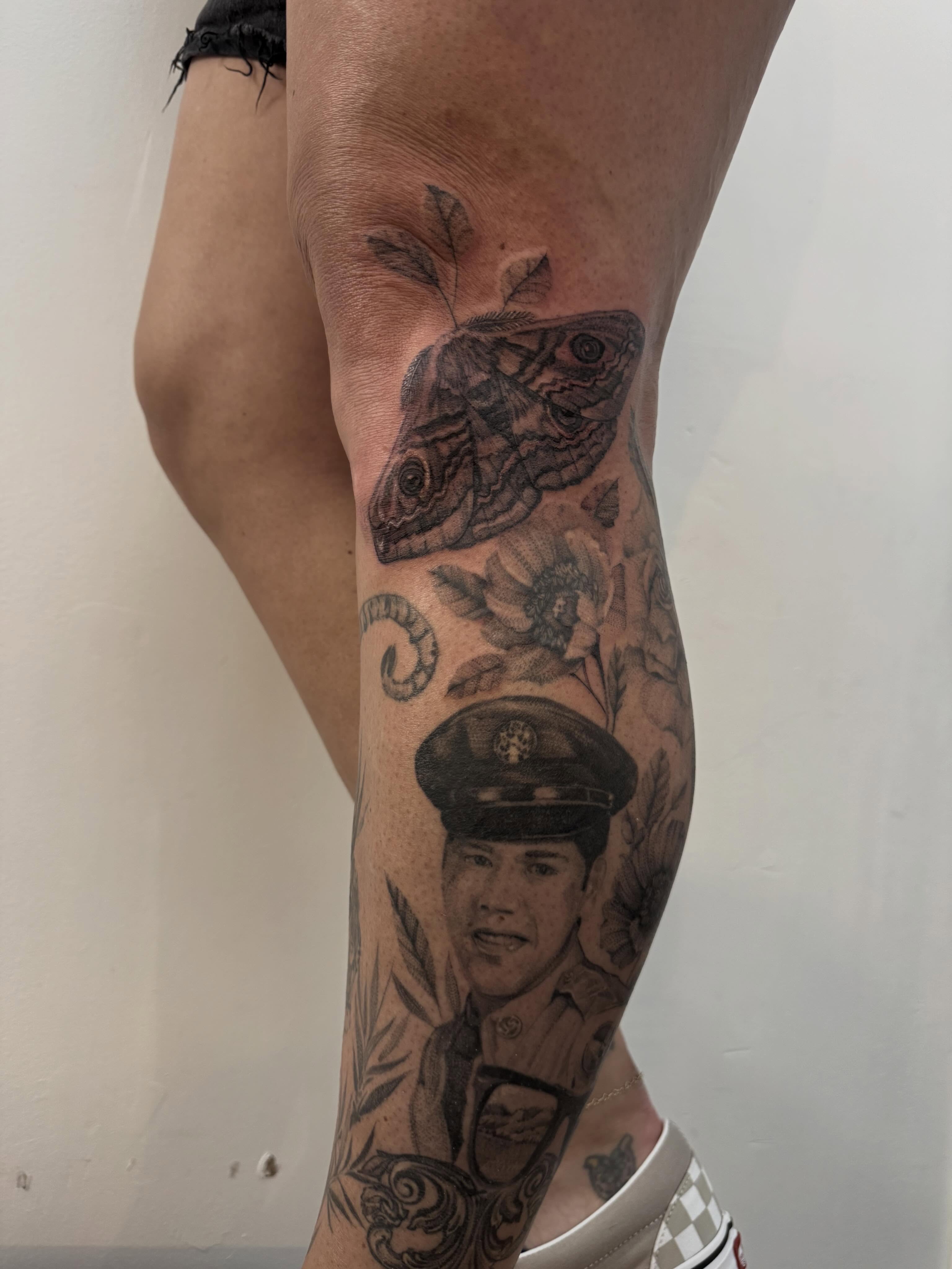 Portrait of a man in uniform realism tattoo on the forearm by Tianna Osborne