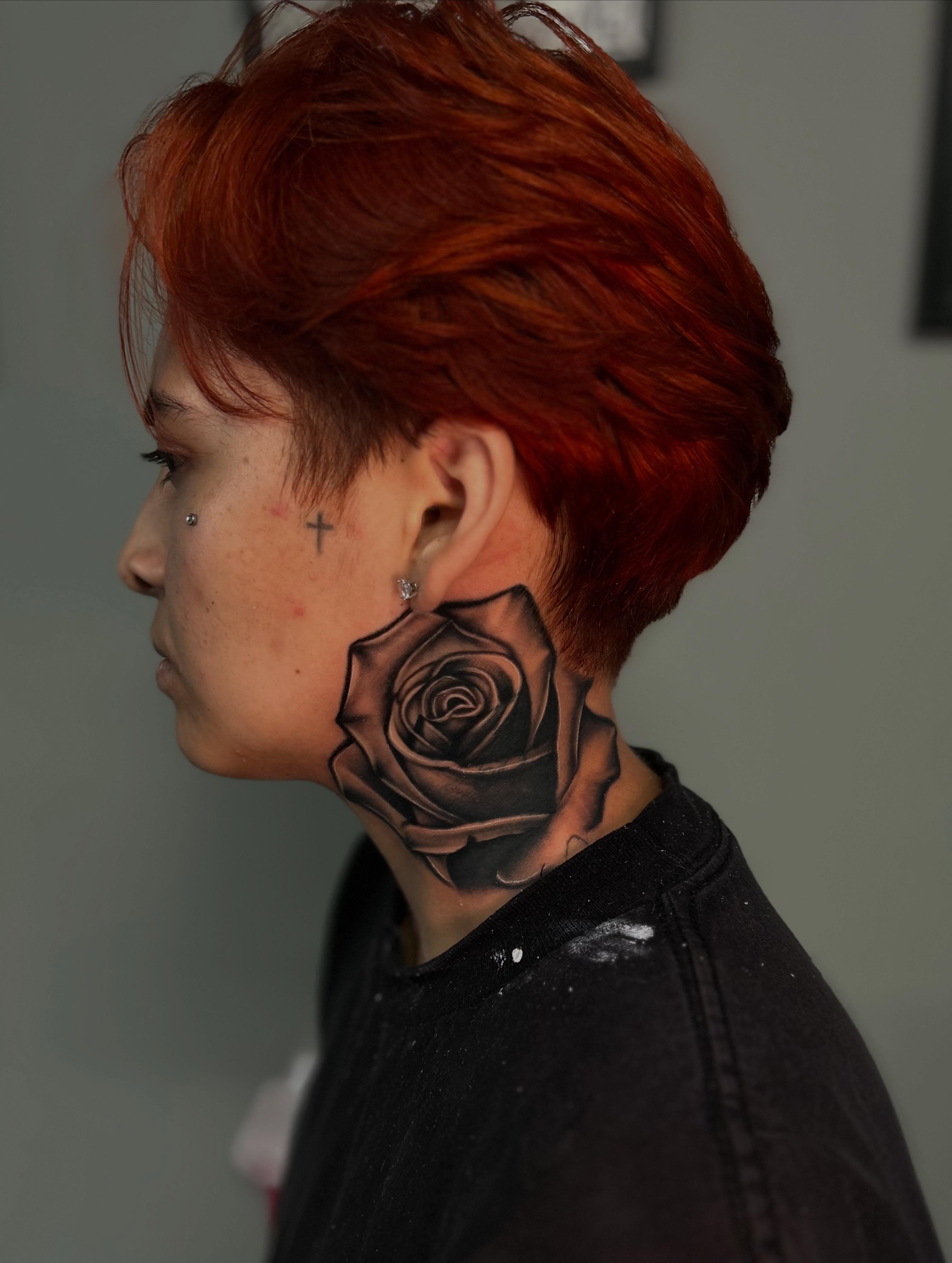 Rose black and grey tattoo on the neck by Tattoo Artist