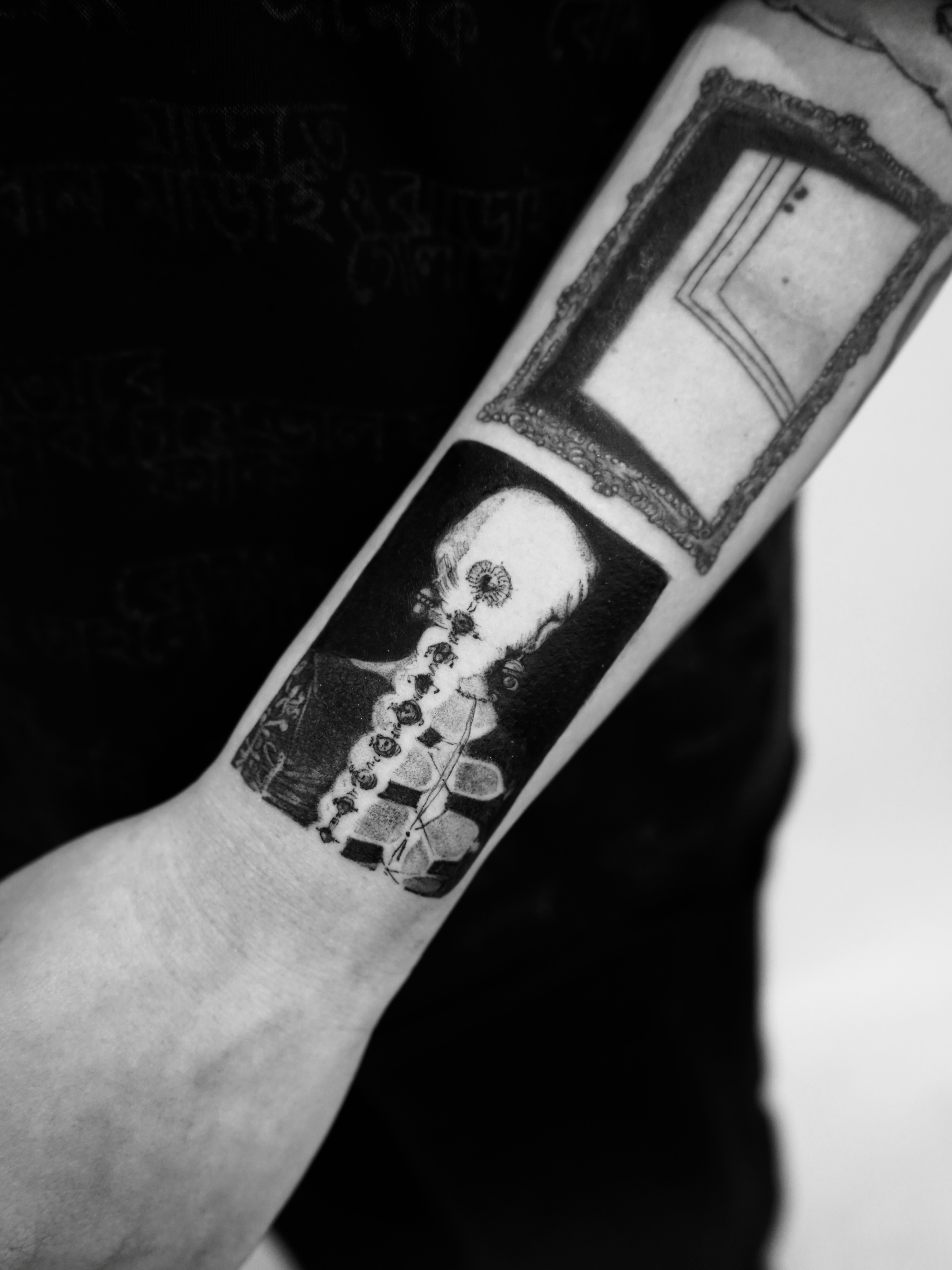 Skull and chessboard realism tattoo on the forearm by Mané, Portland, Oregon