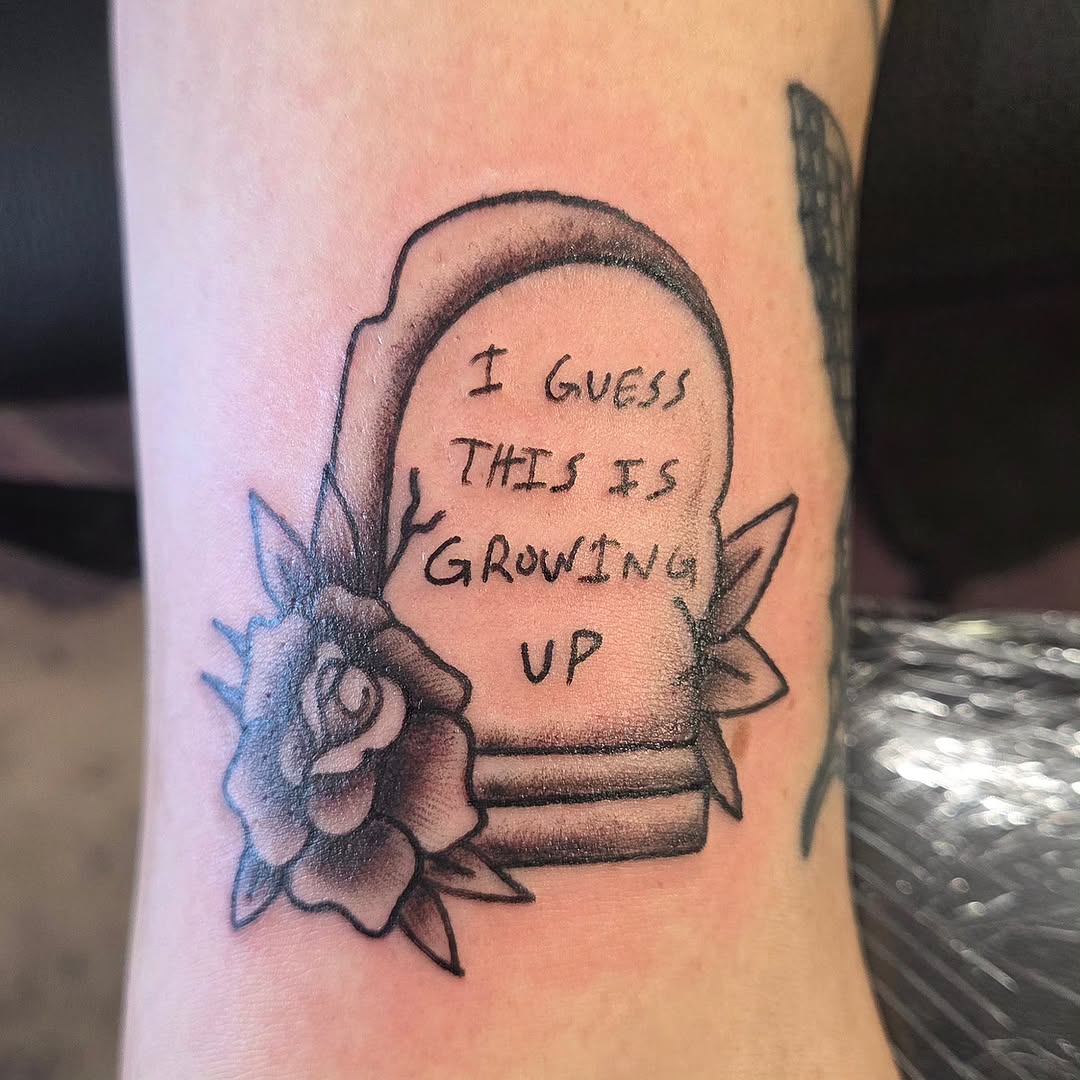 Tattoo by @katconiglioart — lettering_script, black_and_grey