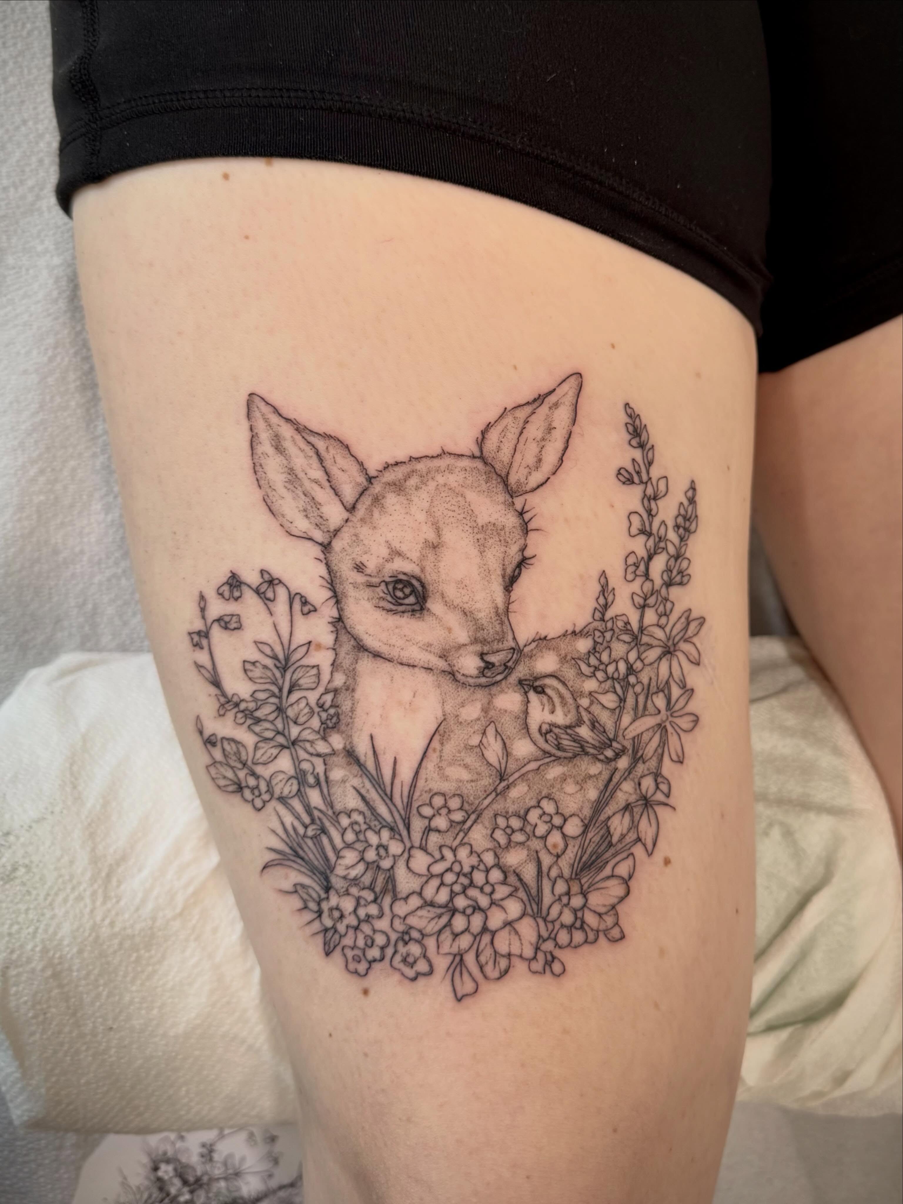 Deer and flowers realism tattoo on the thigh by Daniel Anthony, Philadelphia, Pennsylvania