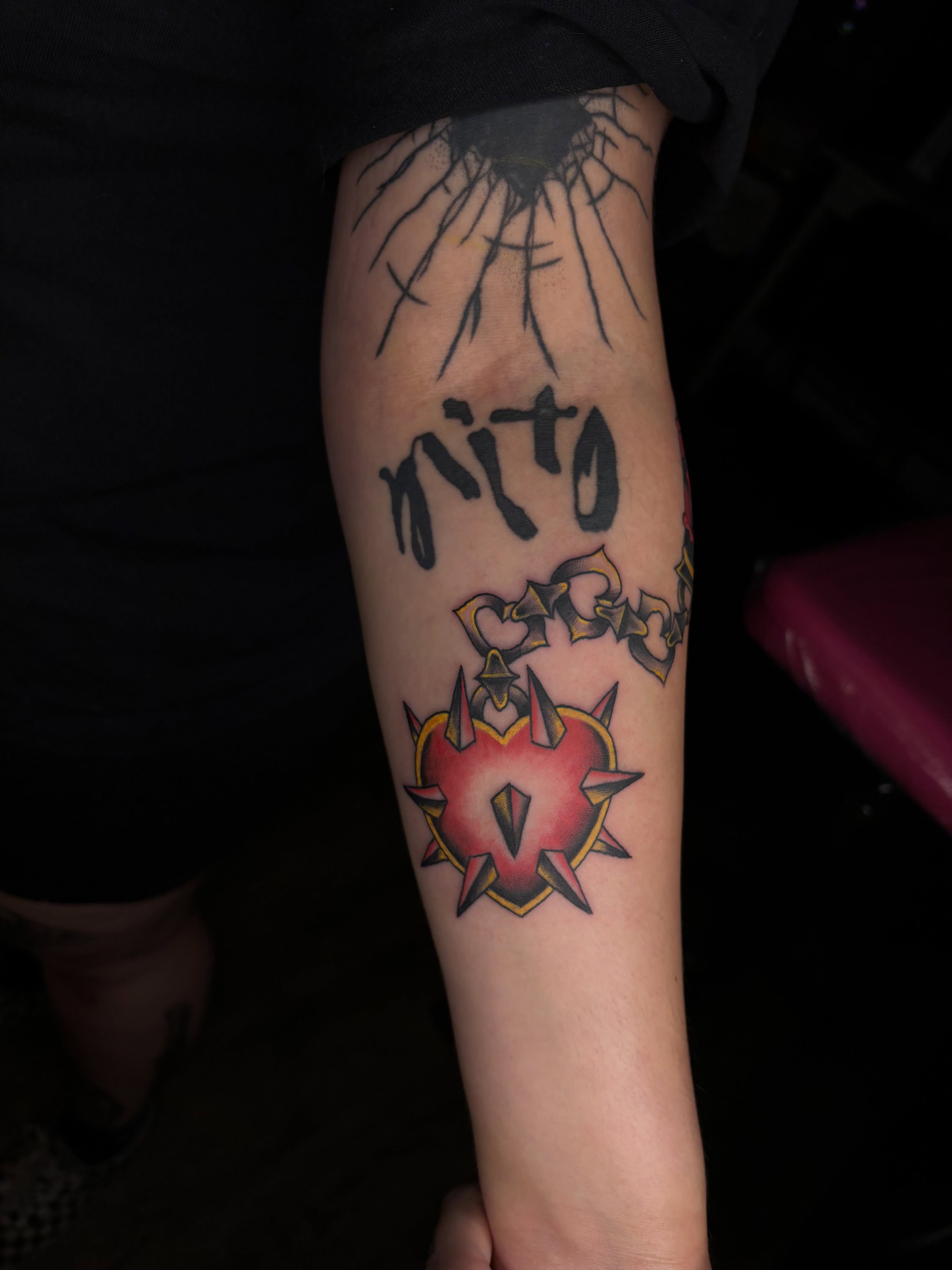 Heart with spikes American traditional tattoo on the forearm by 🔥Zoë Zahasky Tattoos🔥