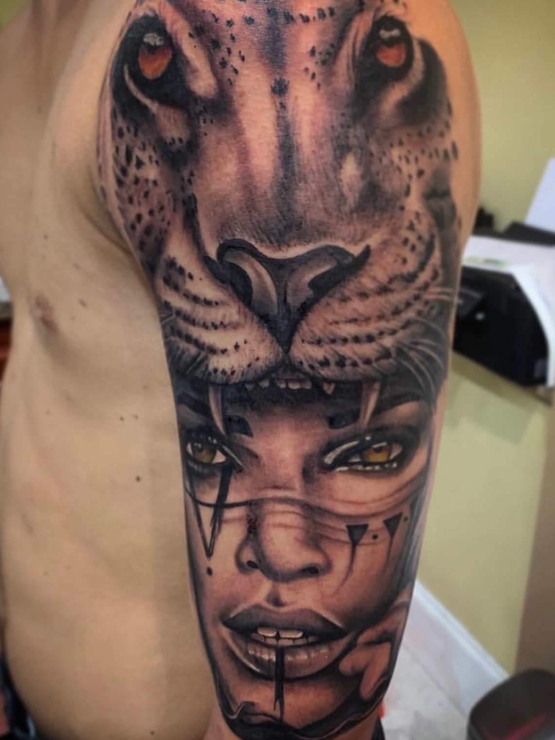 Woman with leopard realism tattoo on the forearm by Devin Johnson, Forest Park, Georgia