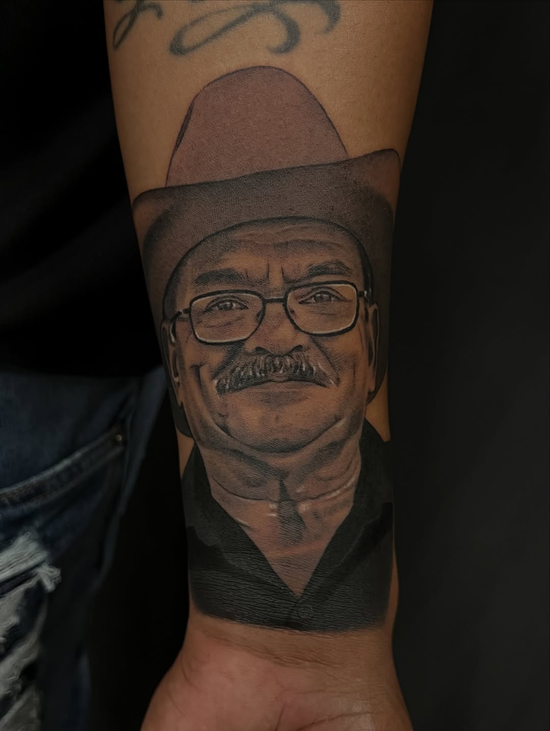 Realism tattoo on the forearm by Thomas Conard