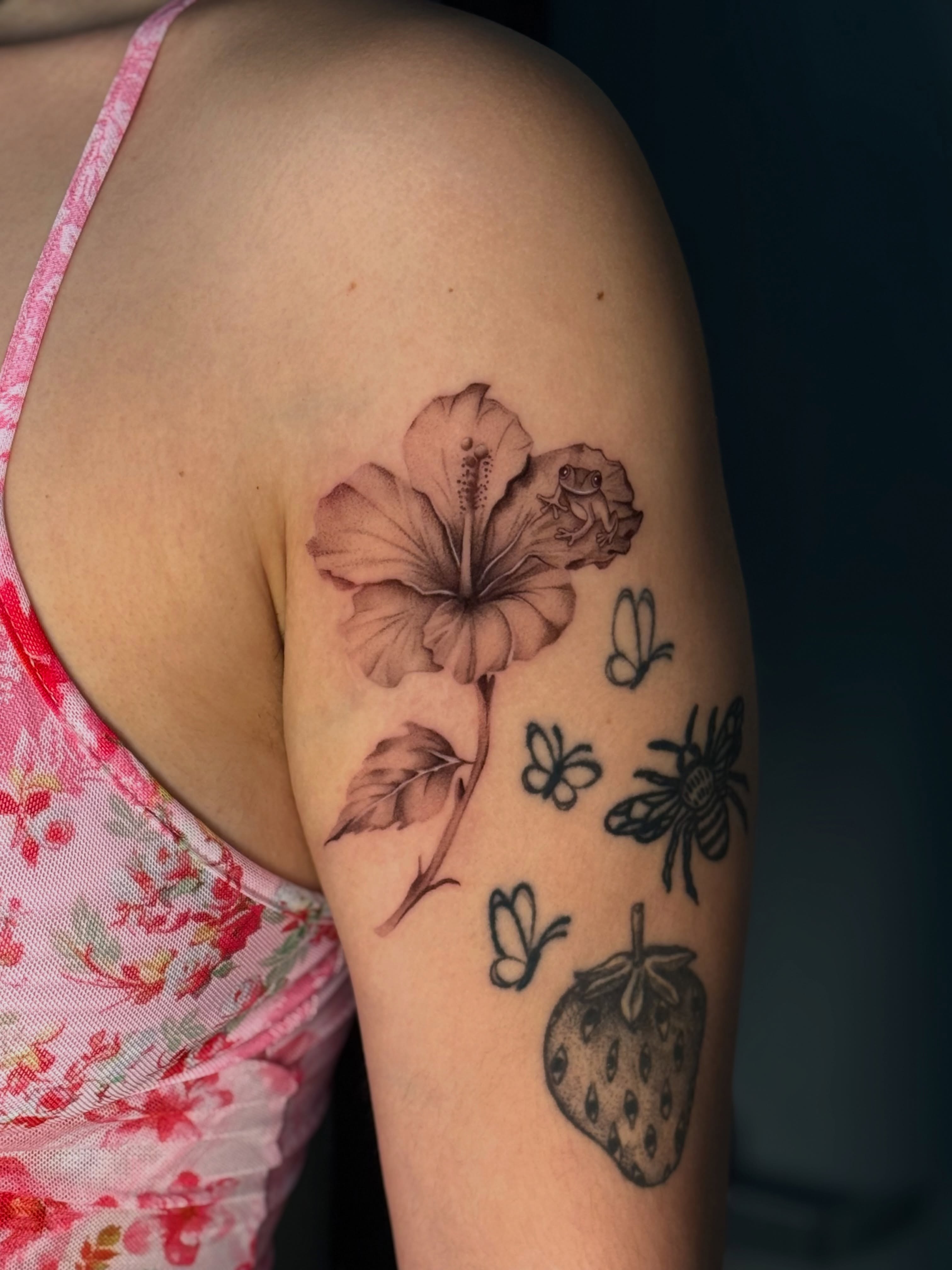 Hibiscus flower realism tattoo on the upper arm by jaz🌀