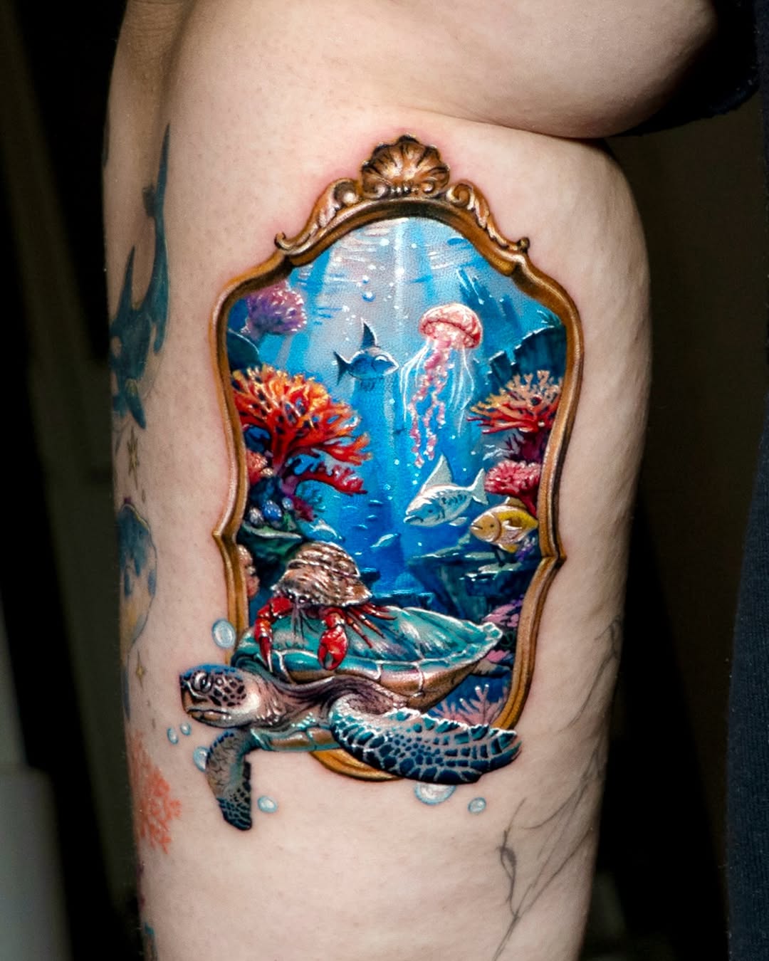 Watercolor tattoo on the upper arm by Tattooist HARRY COLOR