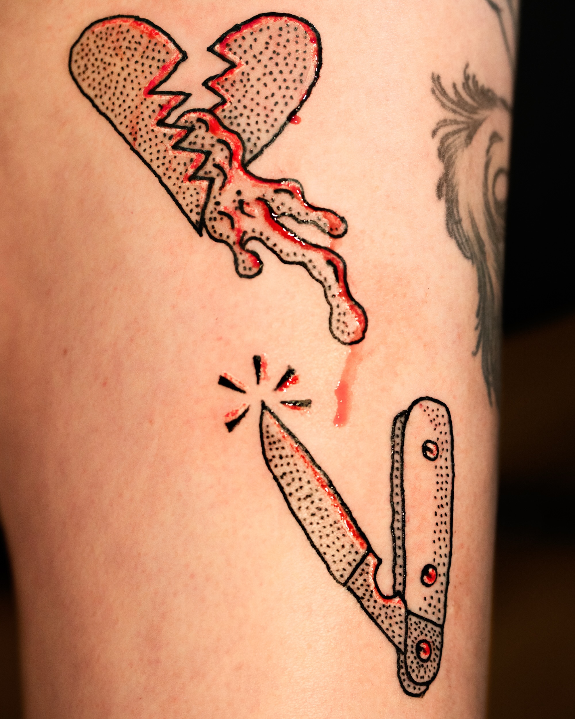 Broken heart and knife dotwork tattoo on the leg by Flash Boom Bang Tattoo