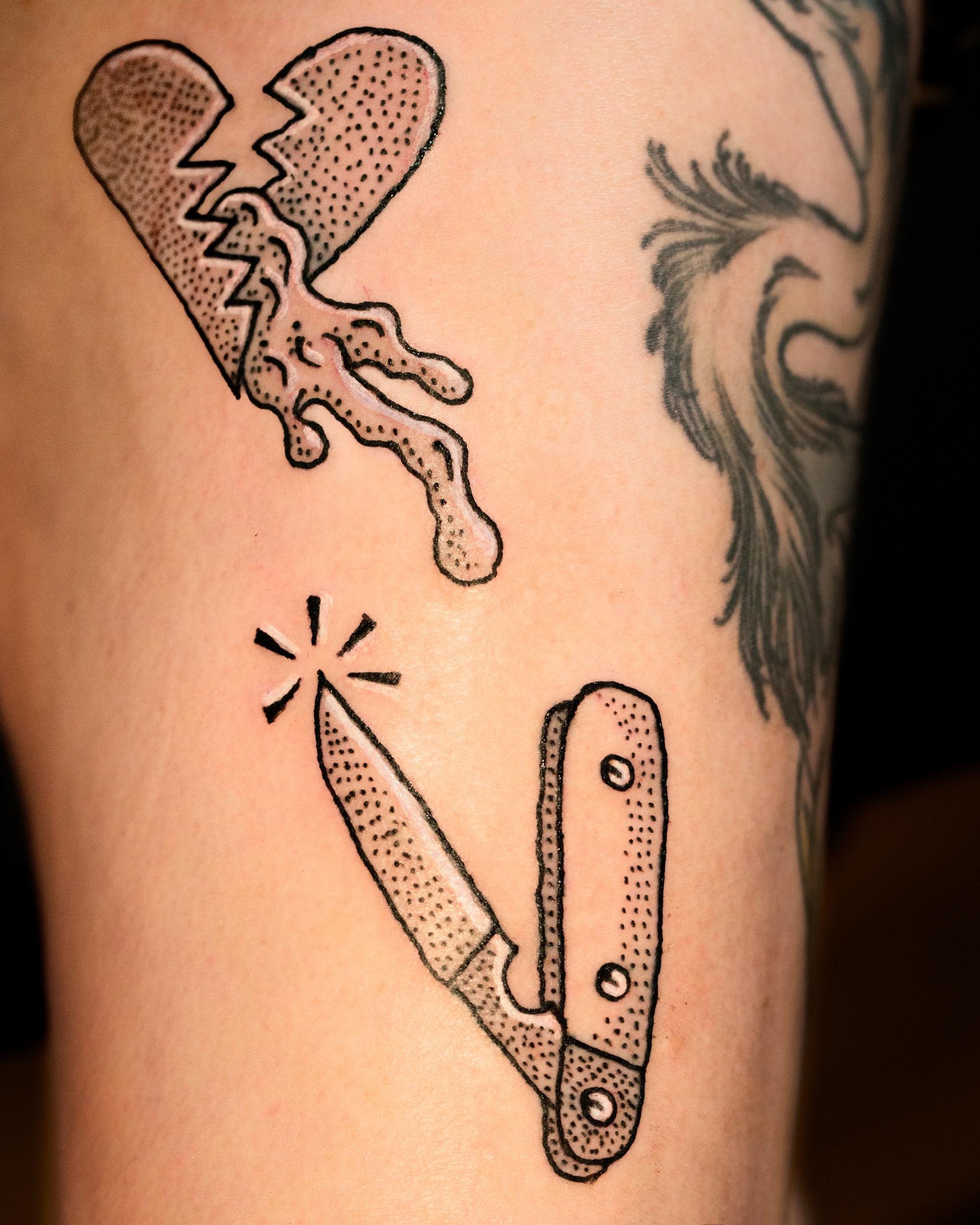 Broken heart and knife dotwork tattoo on the forearm by Flash Boom Bang Tattoo