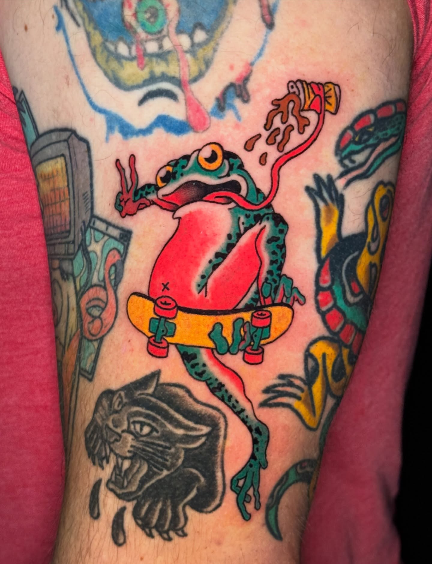 Frog on skateboard American traditional tattoo on the forearm by Celia