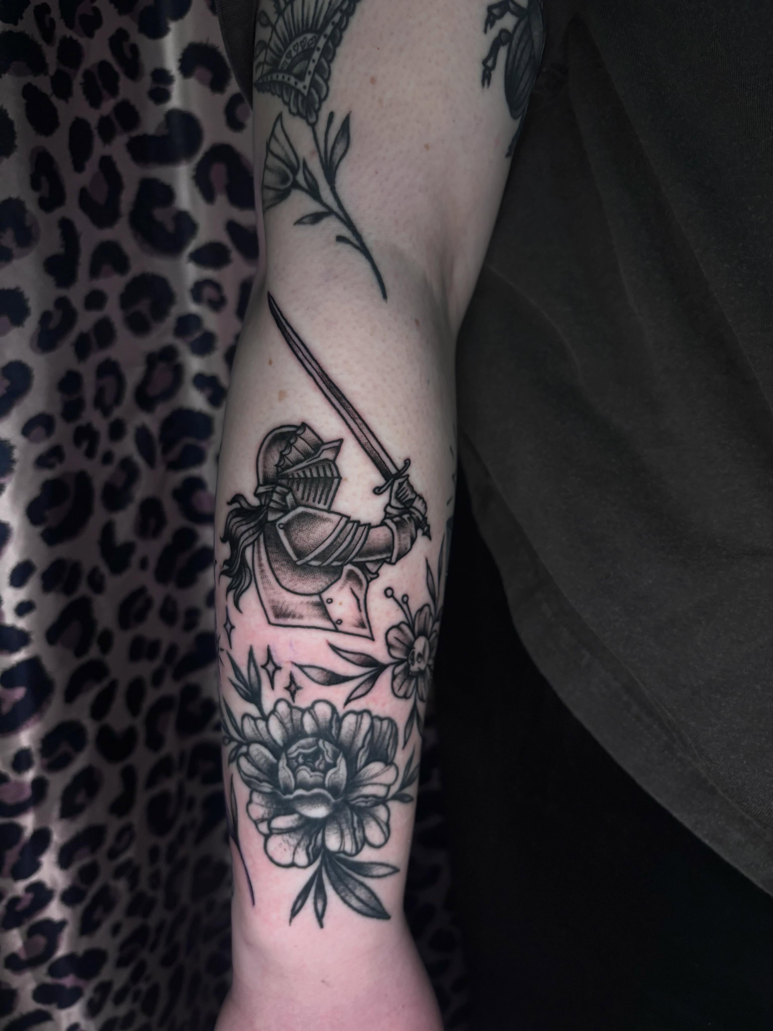 Knight and flowers black and grey tattoo on the forearm by ✯ ❀ emily ruth ❀ ✯