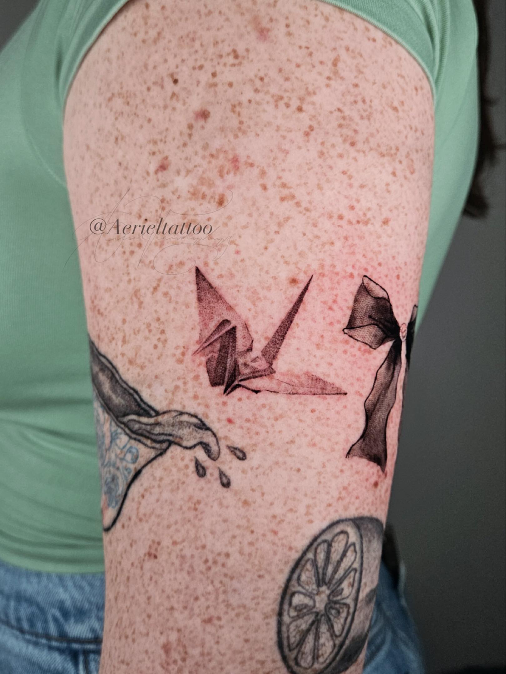 Tattoo by @aerieltattoo — dotwork, realism