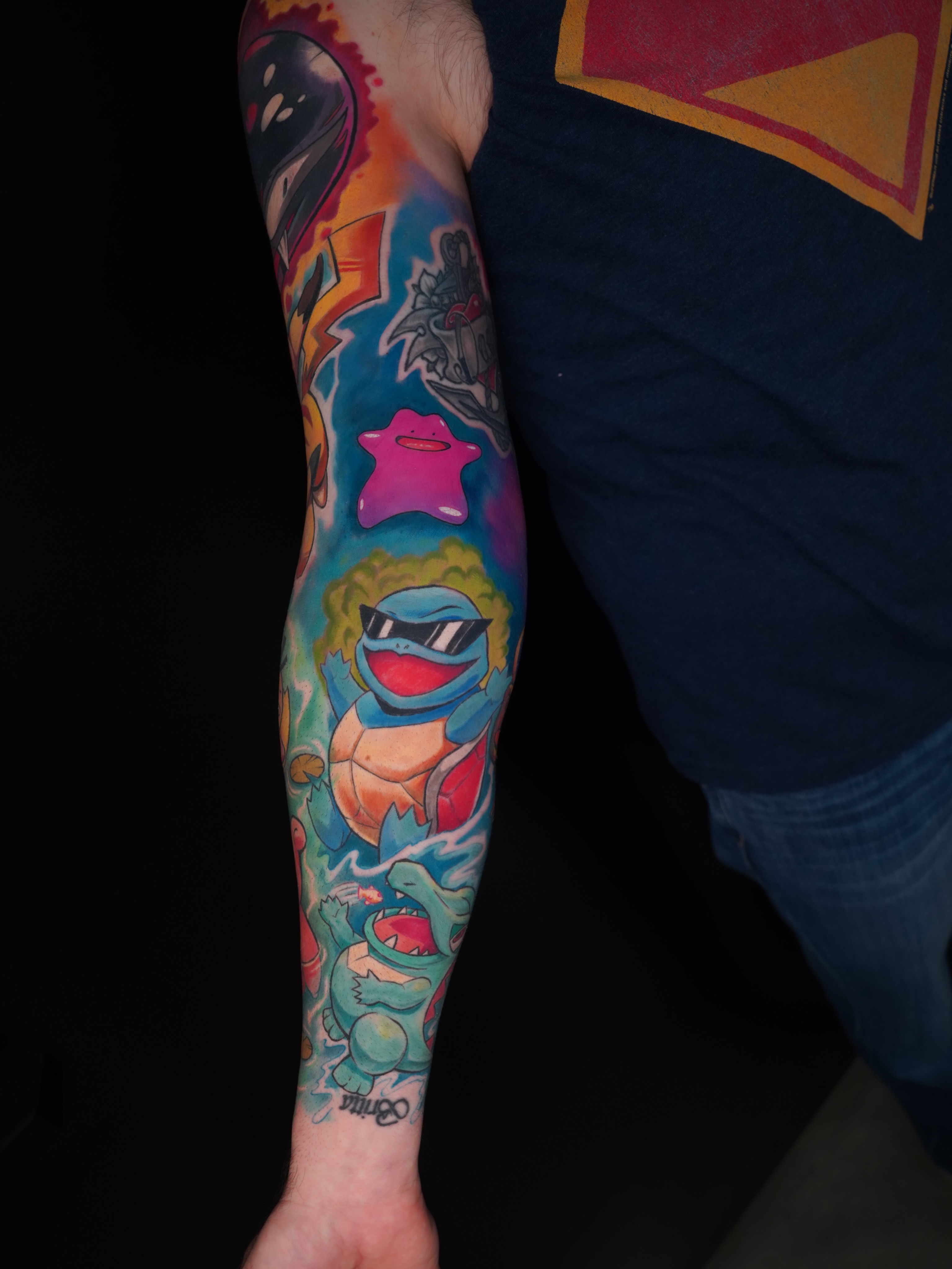 Pokémon characters new school tattoo on the forearm by Derek Foferek, Charlotte, North Carolina
