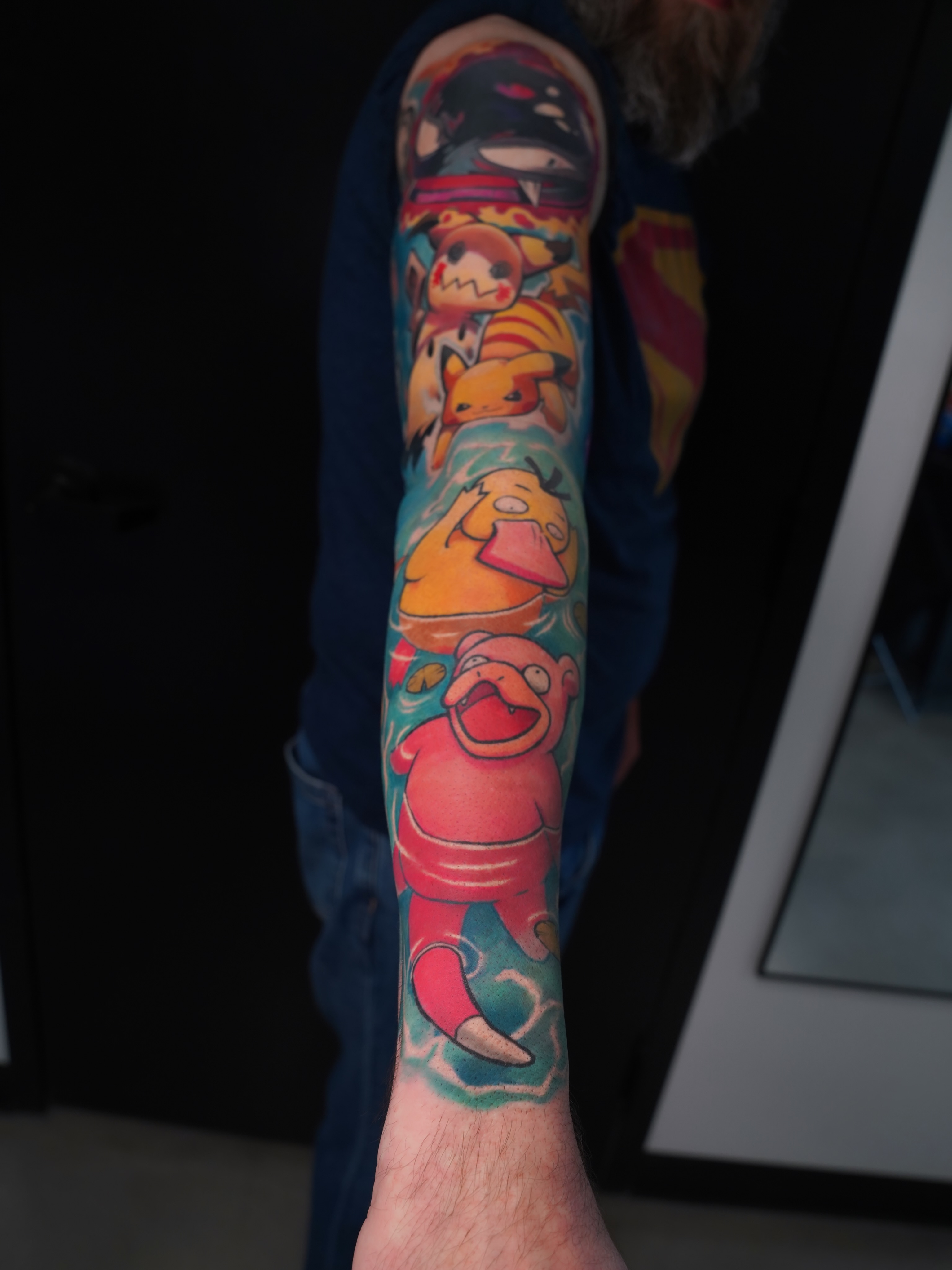Cartoon characters new school tattoo on the forearm by Derek Foferek, Charlotte, North Carolina