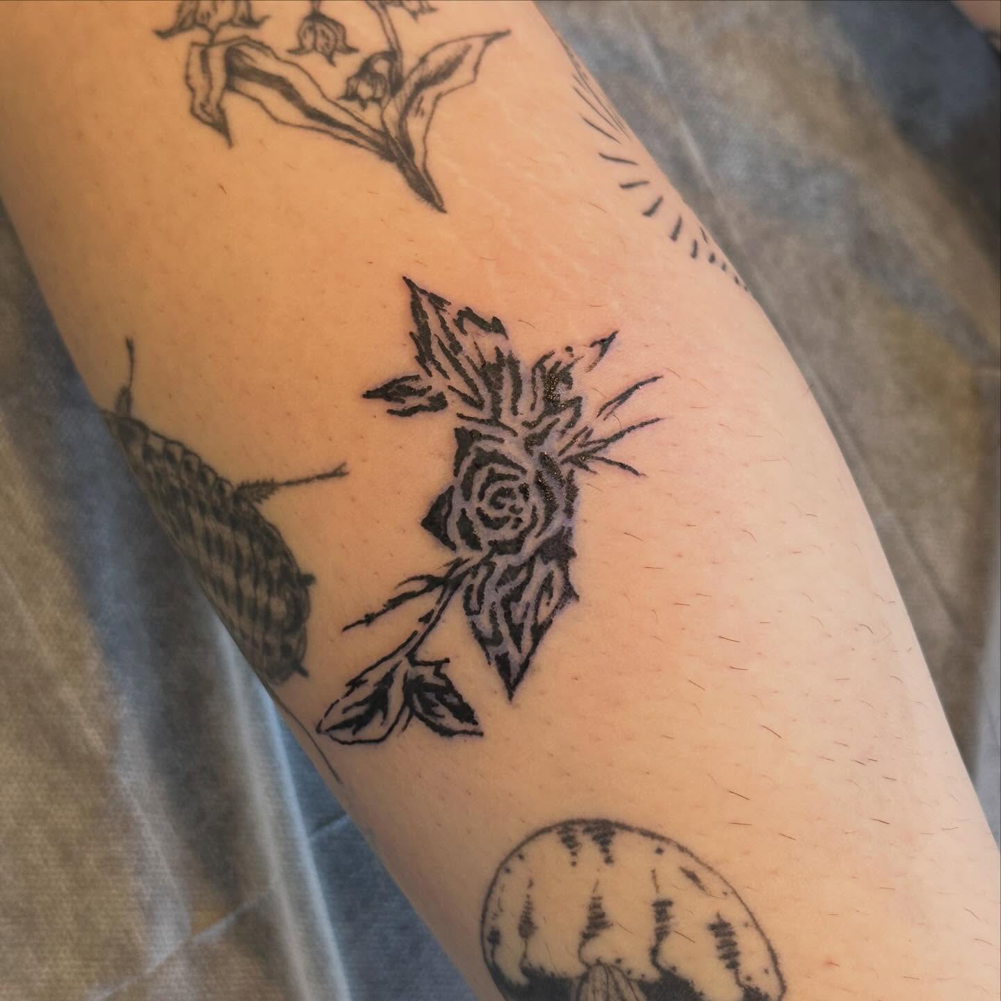 Rose black and grey tattoo on the forearm by Jules🕯️