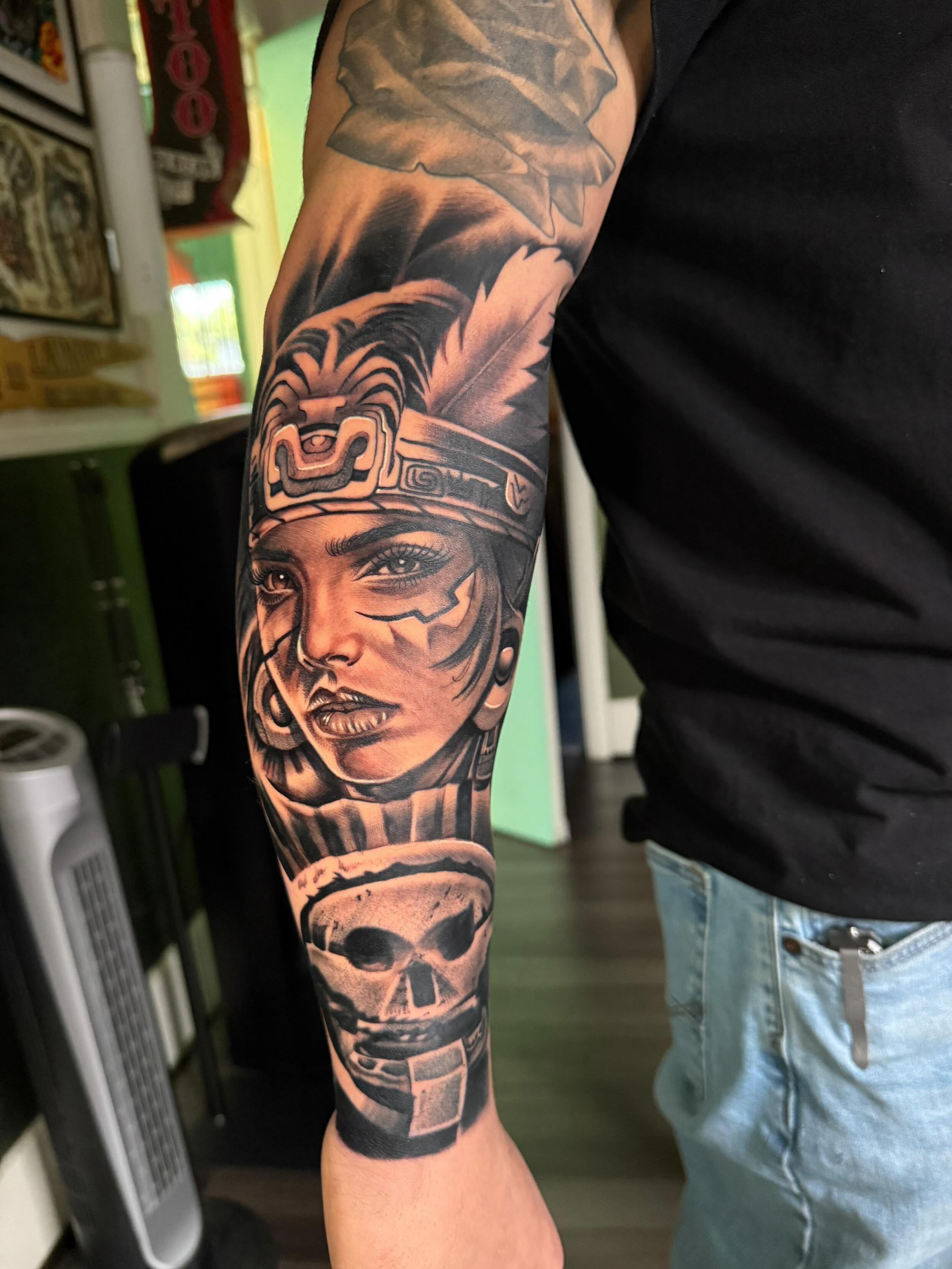 Indian woman with skull realism tattoo on the forearm by “Gonzo