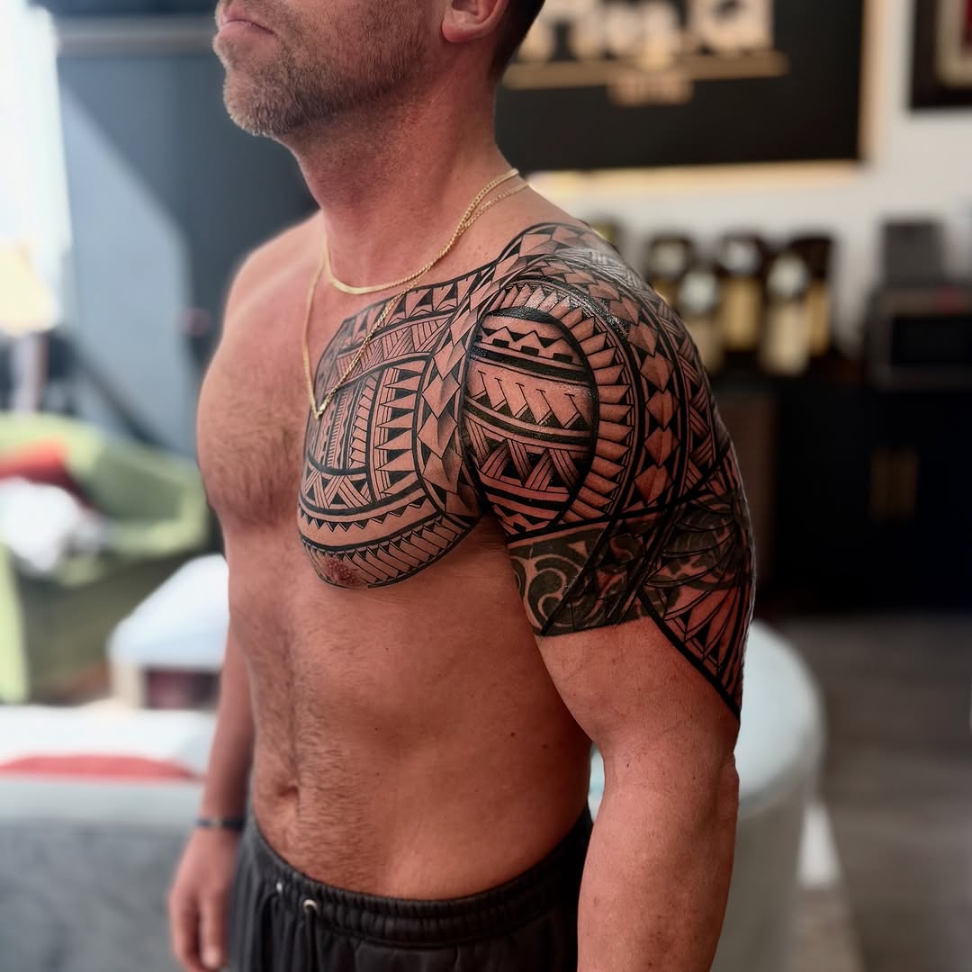 Maori tribal chest and shoulder piece tribal tattoo on the shoulder by Ivy lee