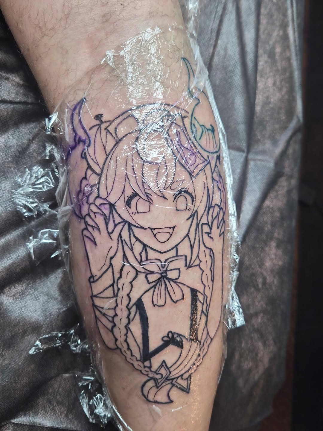 Anime character tattoo on the forearm by Cielle