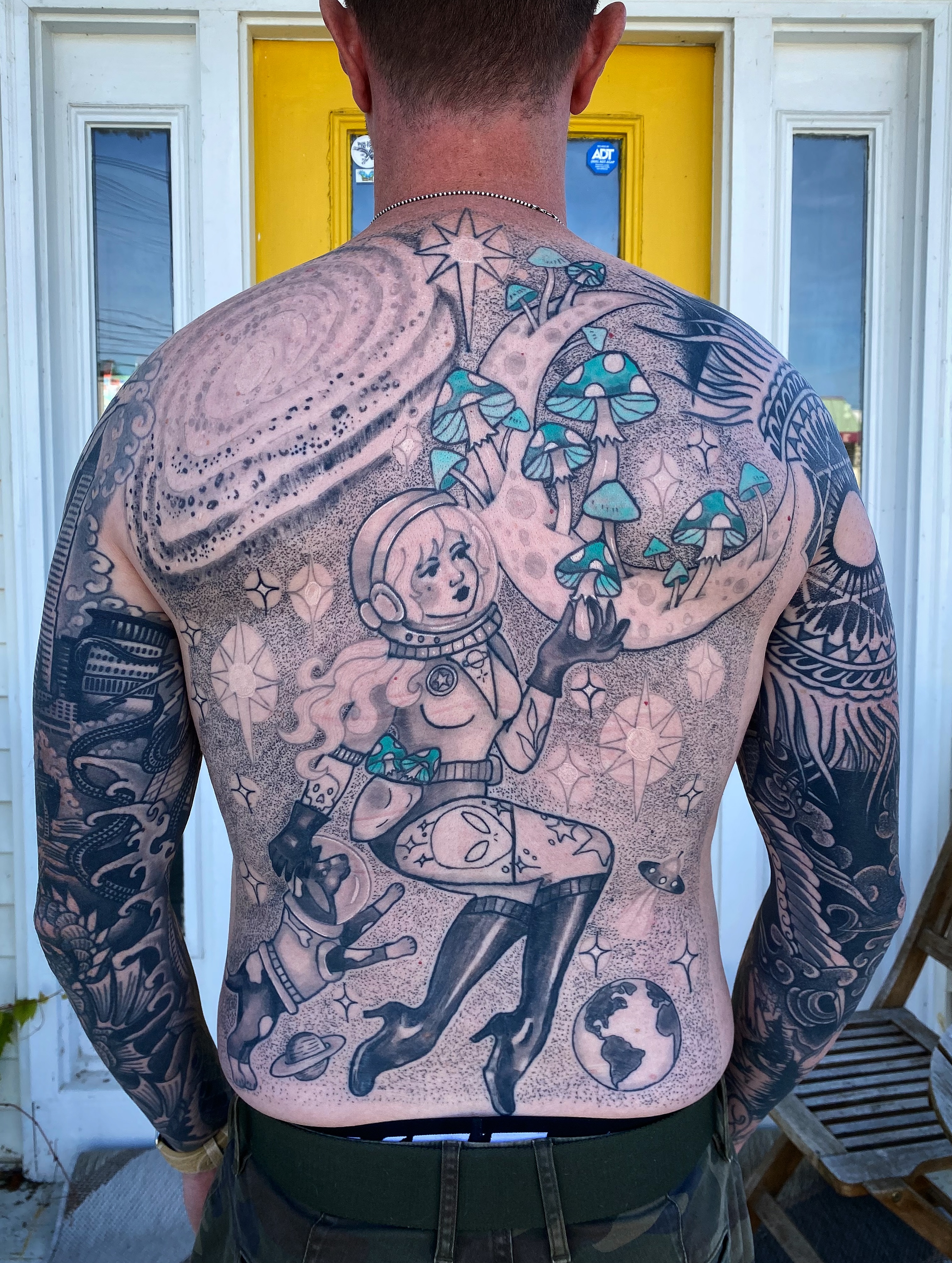 Astronaut with mushrooms dotwork tattoo on the back by Sheila Asbury 💲