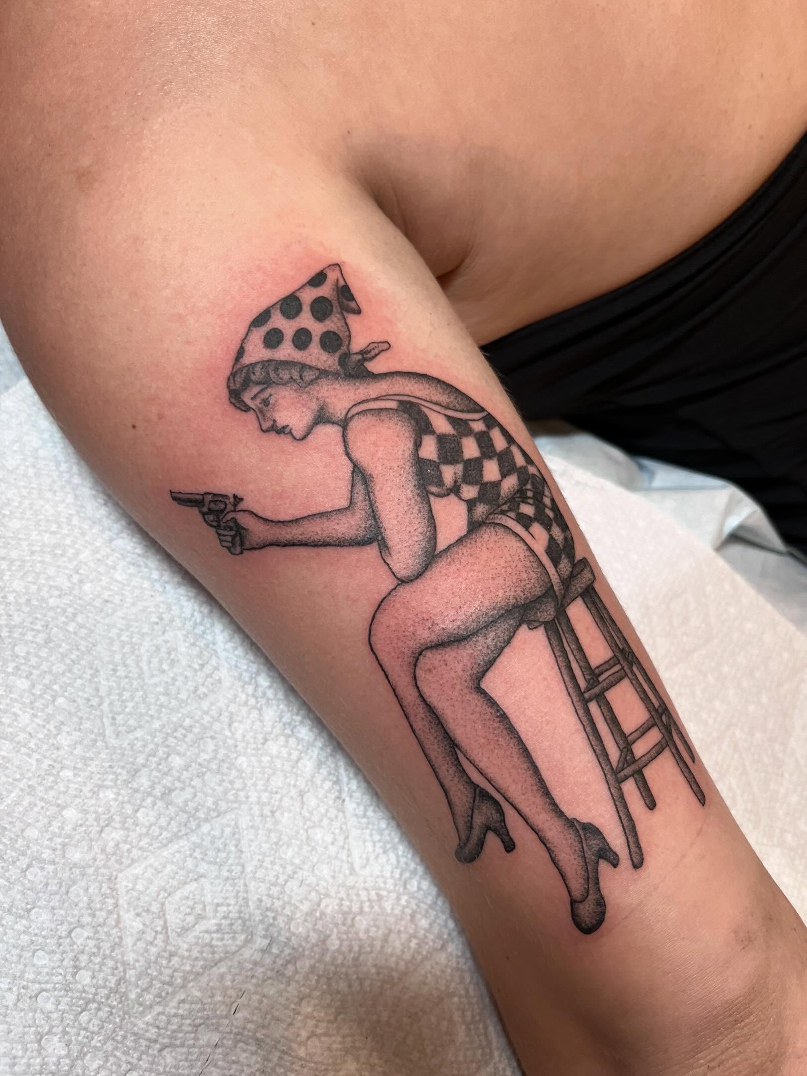 Woman with hat dotwork tattoo on the thigh by Jackson Kirchhoff