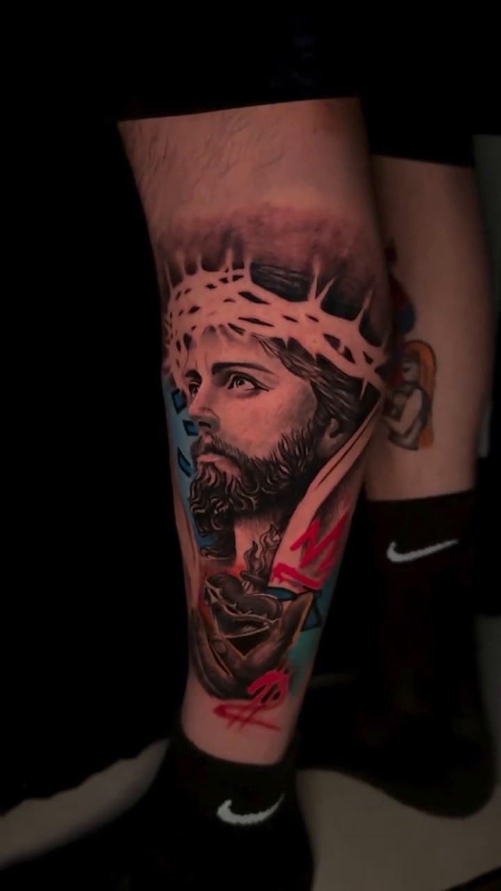 Jesus with crown of thorns surrealism tattoo on the forearm by Aldocasales@tatto