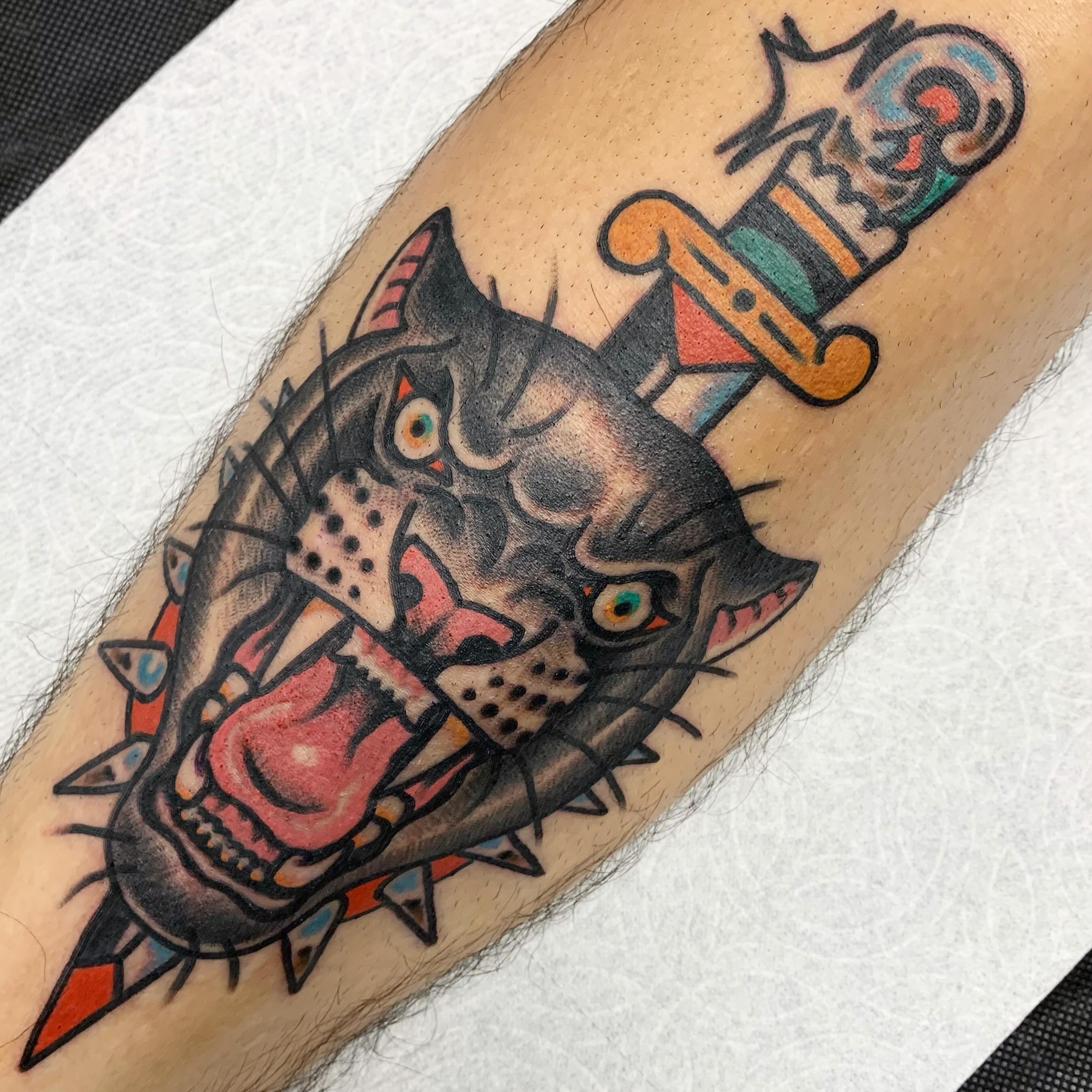Panther and dagger American traditional tattoo on the forearm by Los Angeles Tattoo Artist