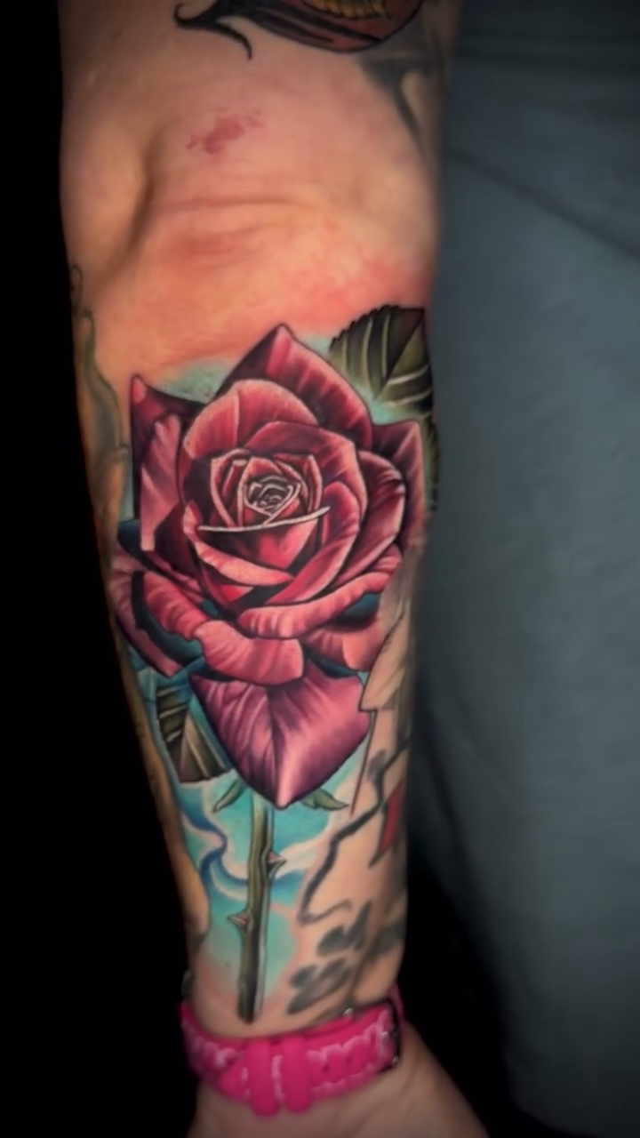 Rose tattoo on arm neo-traditional tattoo on the forearm by Joshua Orville Vaughn, Kansas City, Missouri