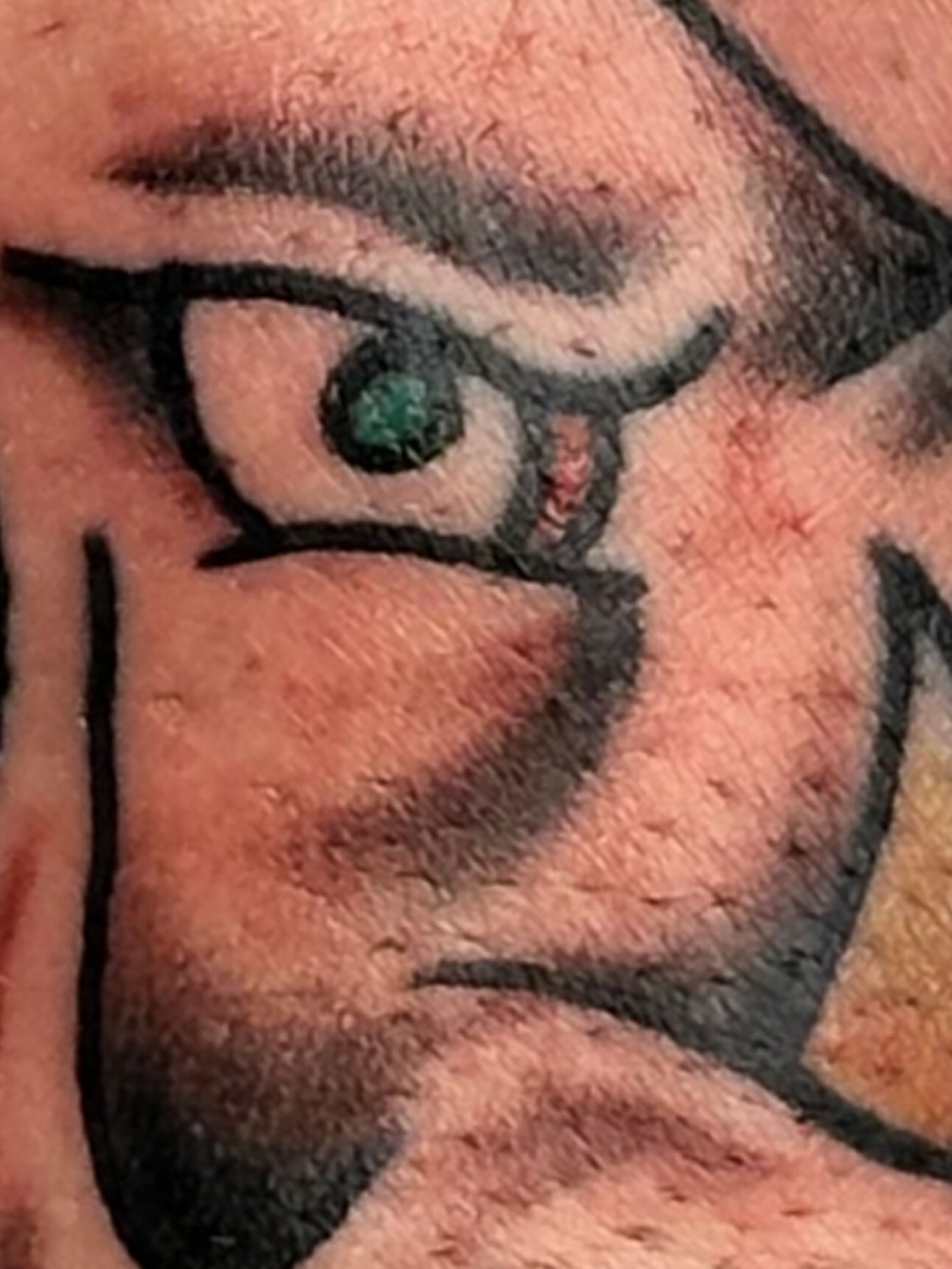 Eye American traditional tattoo on the head by Stephen Galena