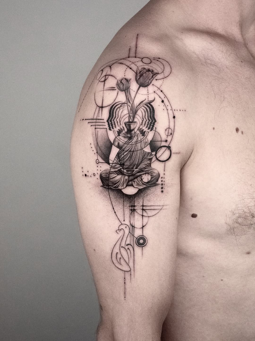 Geometric tattoo on the shoulder by János Bozóki, Budapest, Hungary