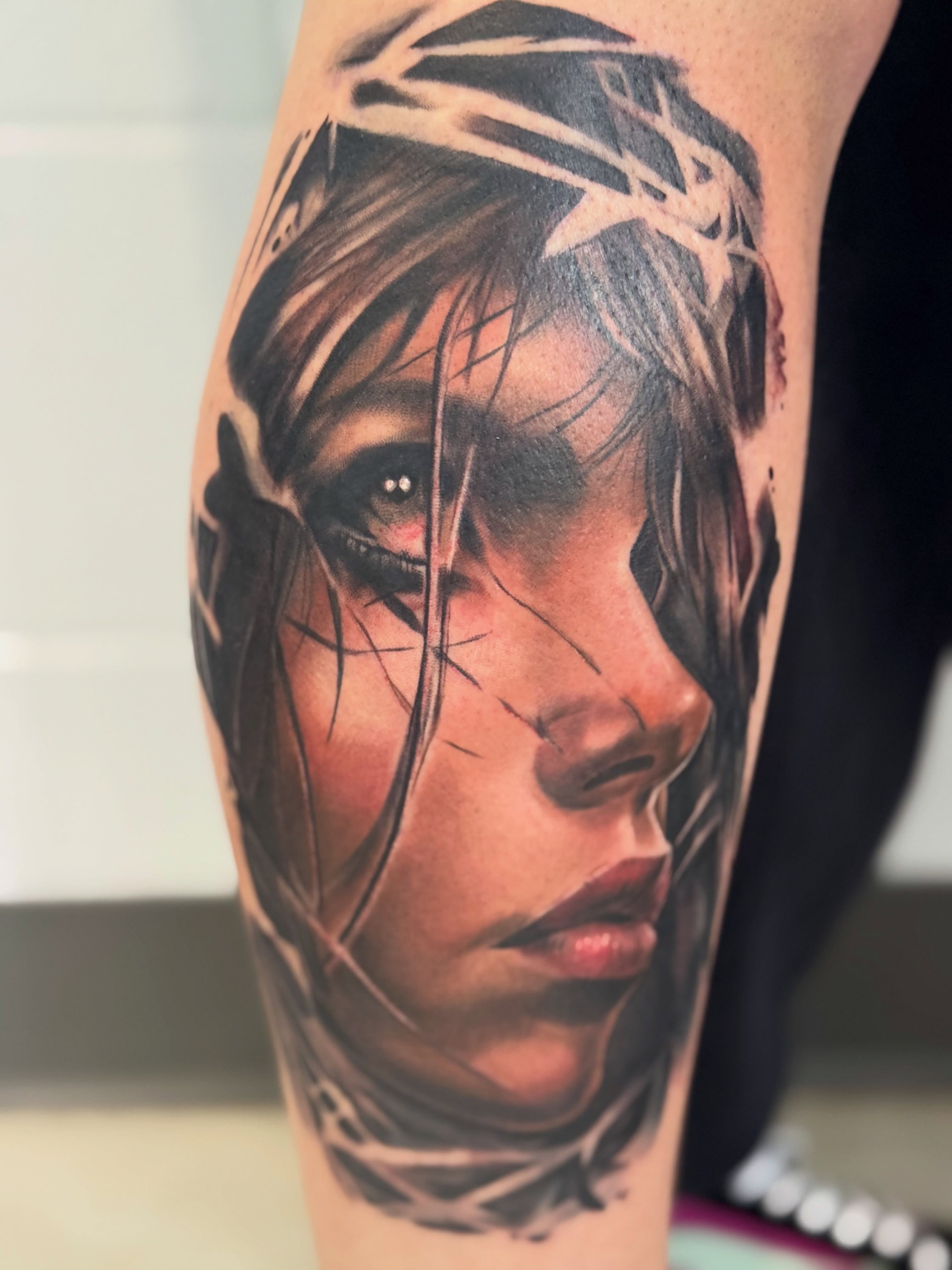 Woman's face realism tattoo on the forearm by Dustin Kaiser, Mentor, Ohio