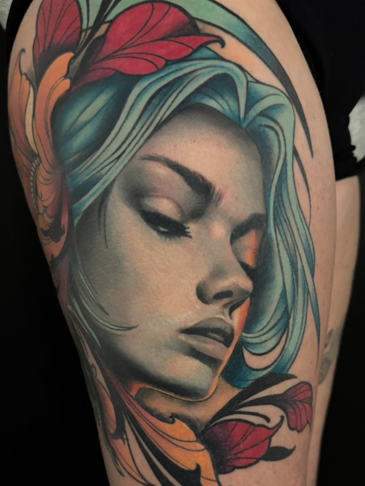 Woman's face American traditional tattoo on the forearm by Dustin Kaiser, Mentor, Ohio