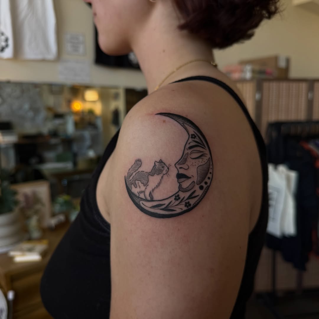 Moon and cat black and grey tattoo on the shoulder by Leah - Tattoo Artist