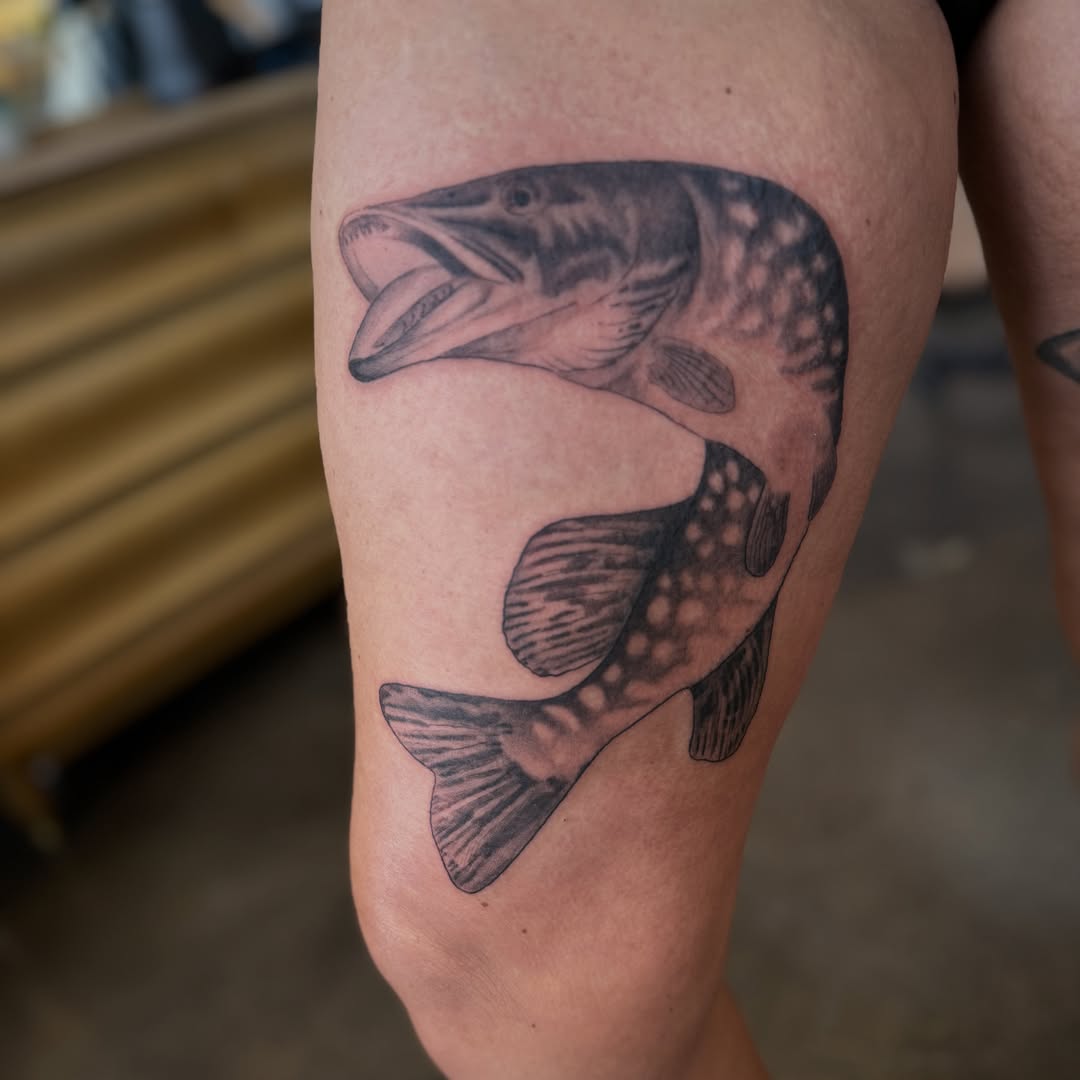 Pike realism tattoo on the thigh by Leah - Tattoo Artist