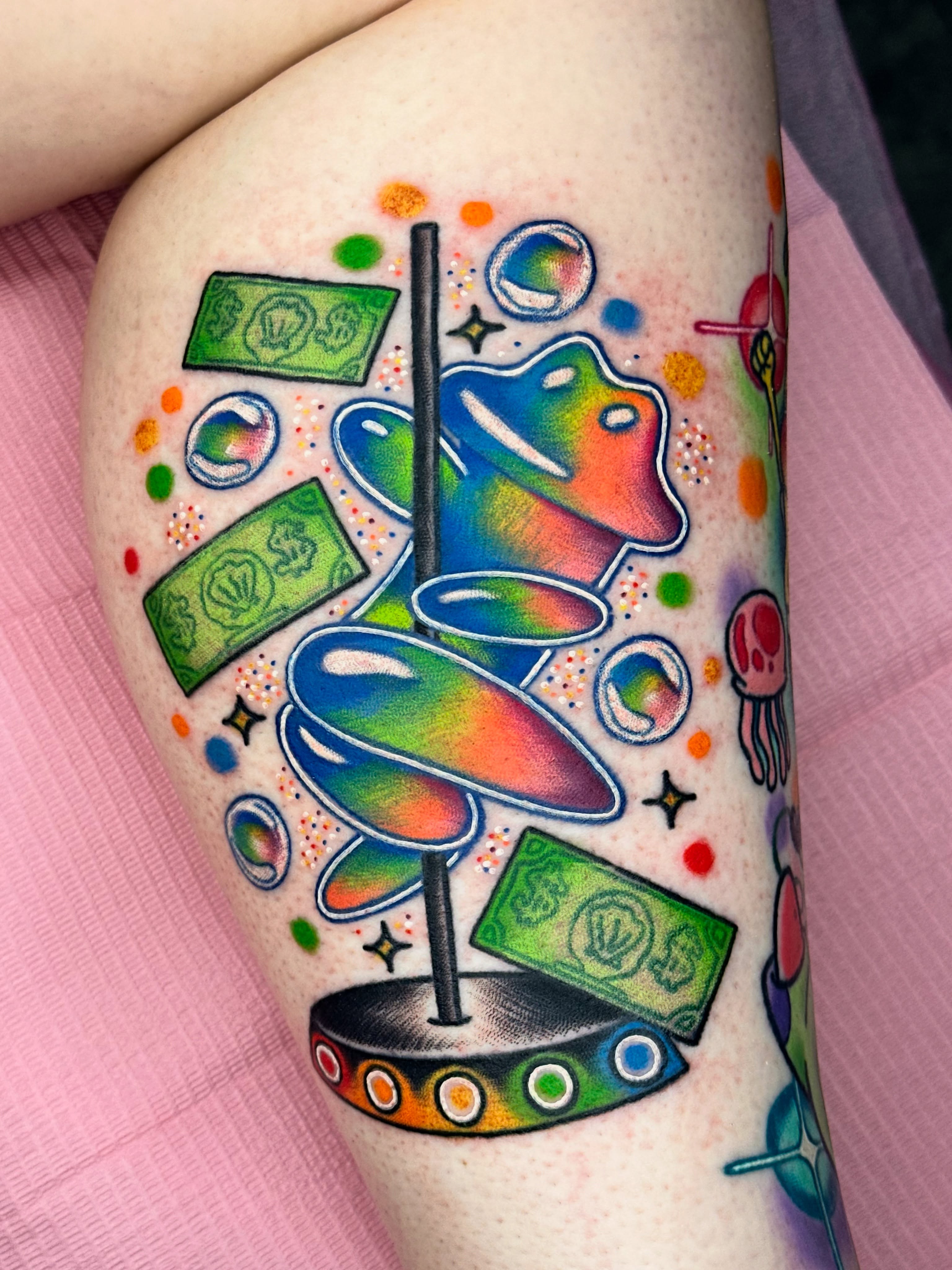 Snake and money American traditional tattoo on the thigh by Isabel