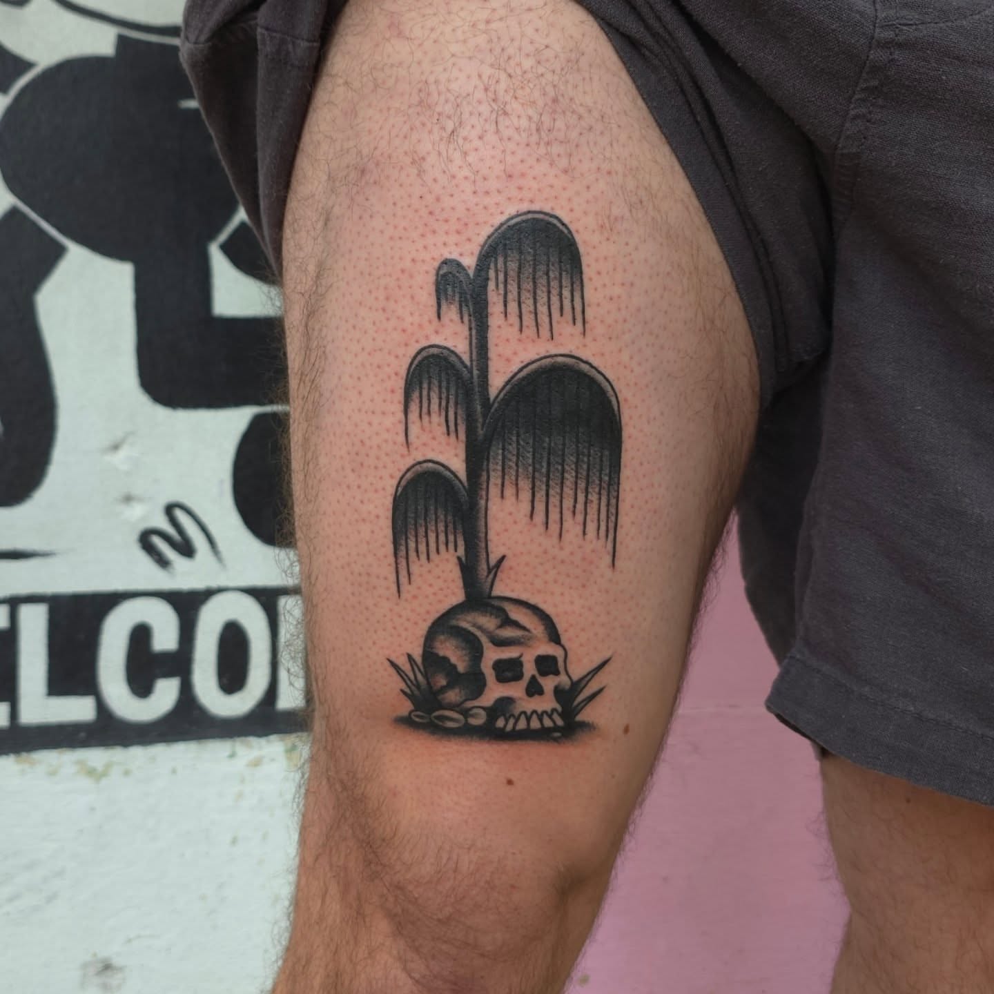 Skull with cactus dotwork tattoo on the thigh by Jared Green