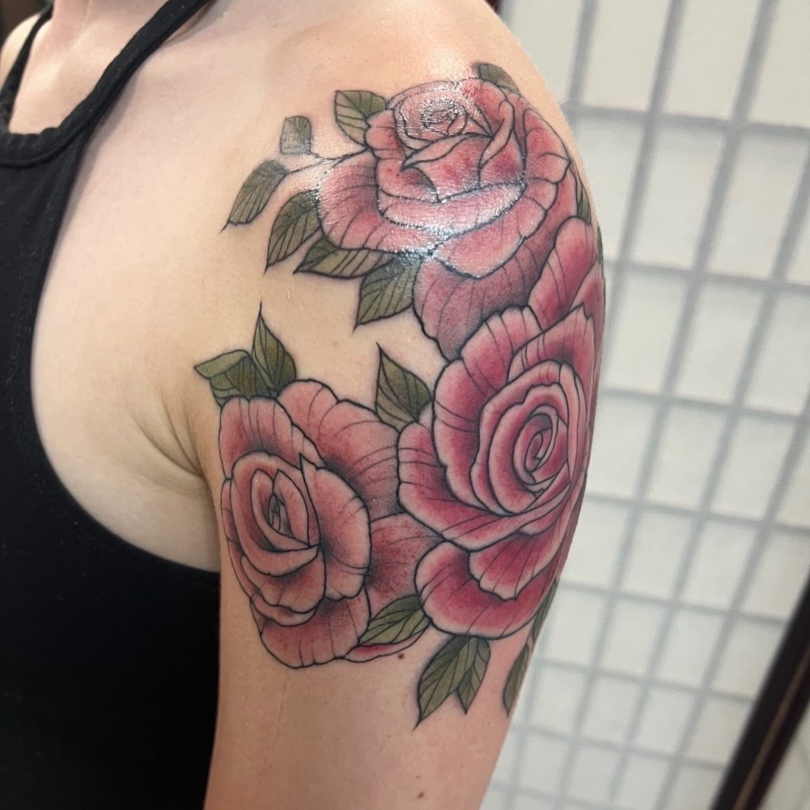 Roses realism tattoo on the shoulder by Brianna Jo Ballinghoff