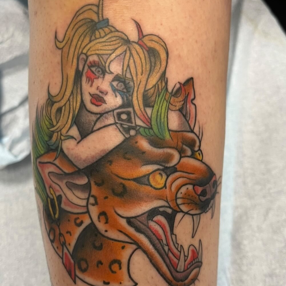 Woman riding panther American traditional tattoo on the forearm by Brianna Jo Ballinghoff