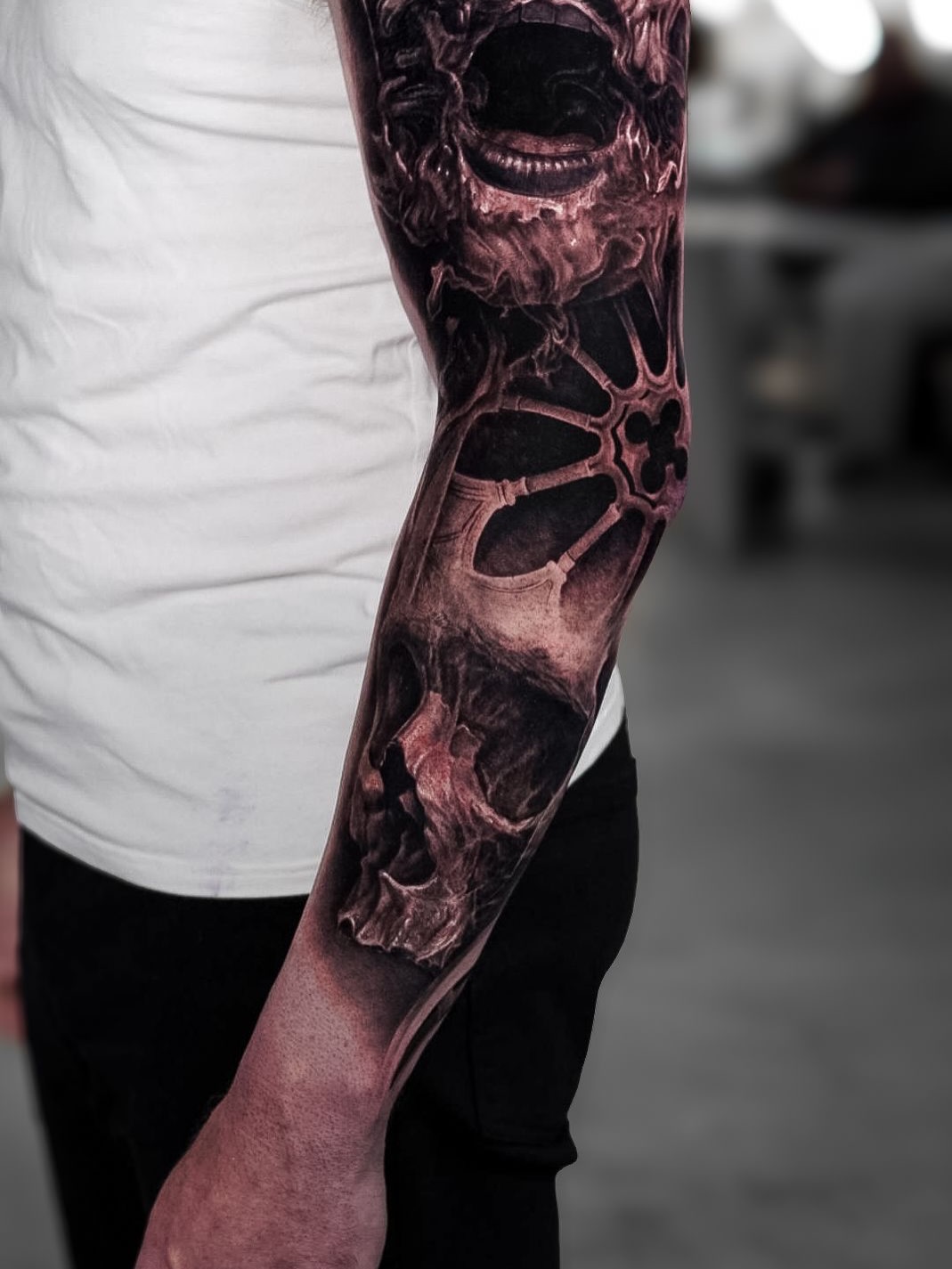 Skull and abstract elements realism tattoo on the forearm by Ｄａｖｉｄ Ｂａｅｎａ Ｔａｔｔｏｏ