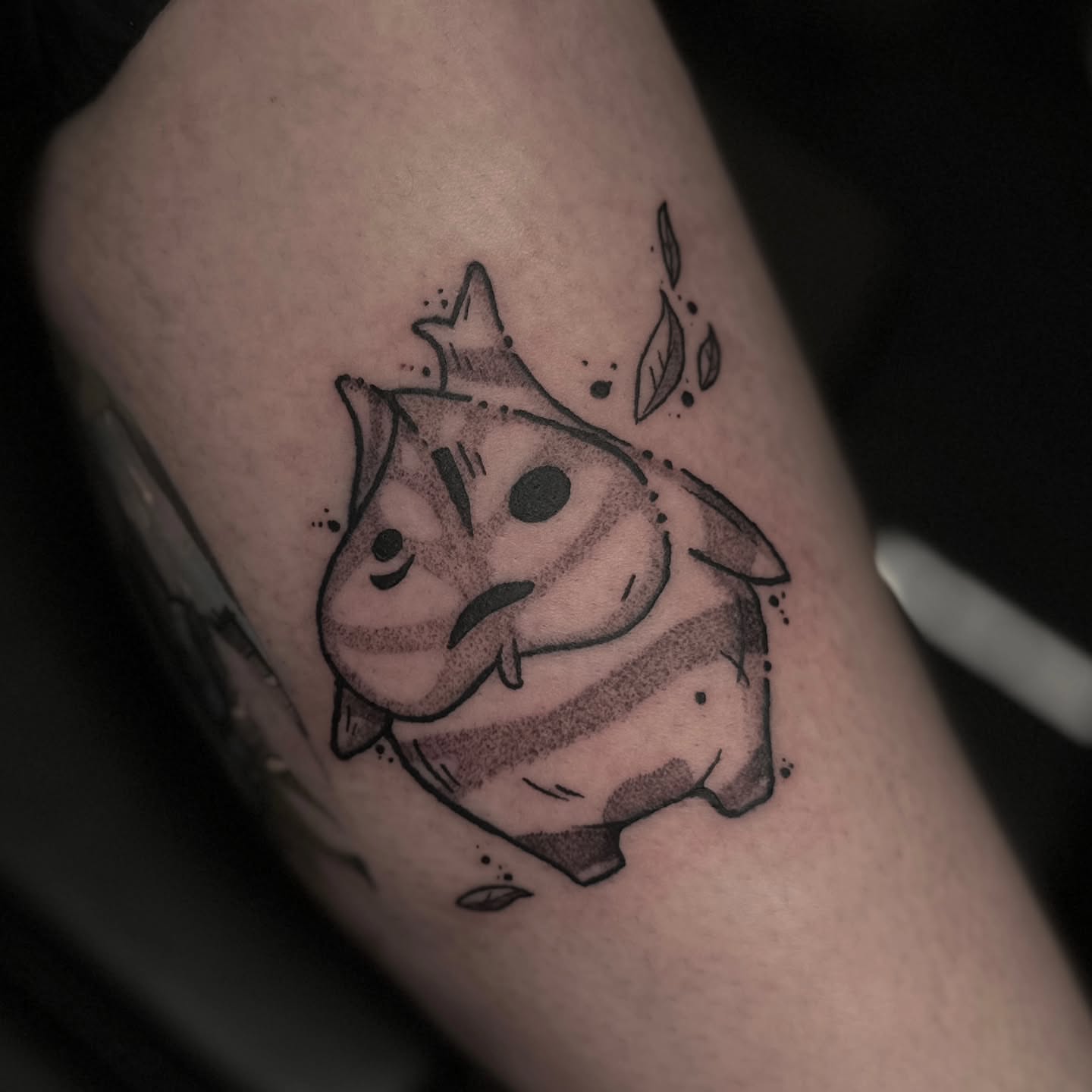 Striped cat dotwork tattoo on the forearm by Benjamin Frost