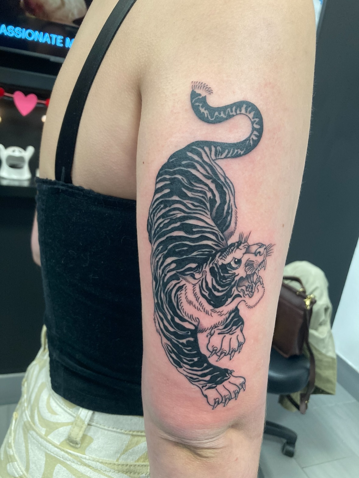 Tiger black and grey tattoo on the forearm by Ash Nicole Painterly, San Diego, California
