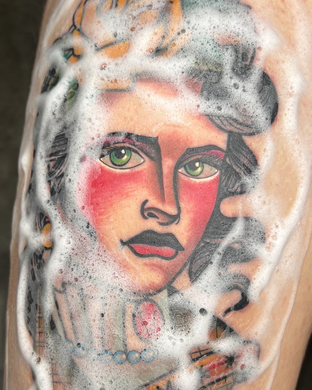 Woman's face American traditional tattoo on the forearm by Massimiliano pennella