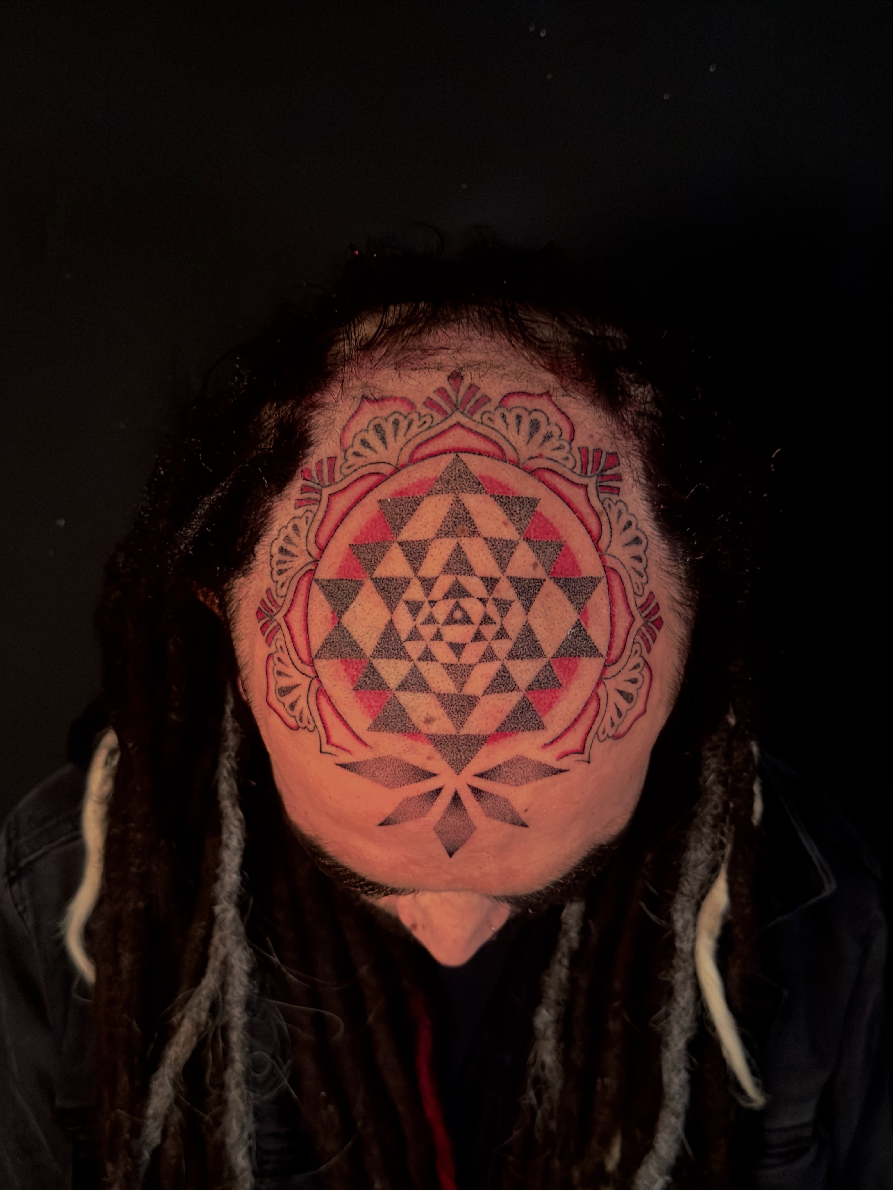 Sri yantra geometric tattoo on the head by Chelsey